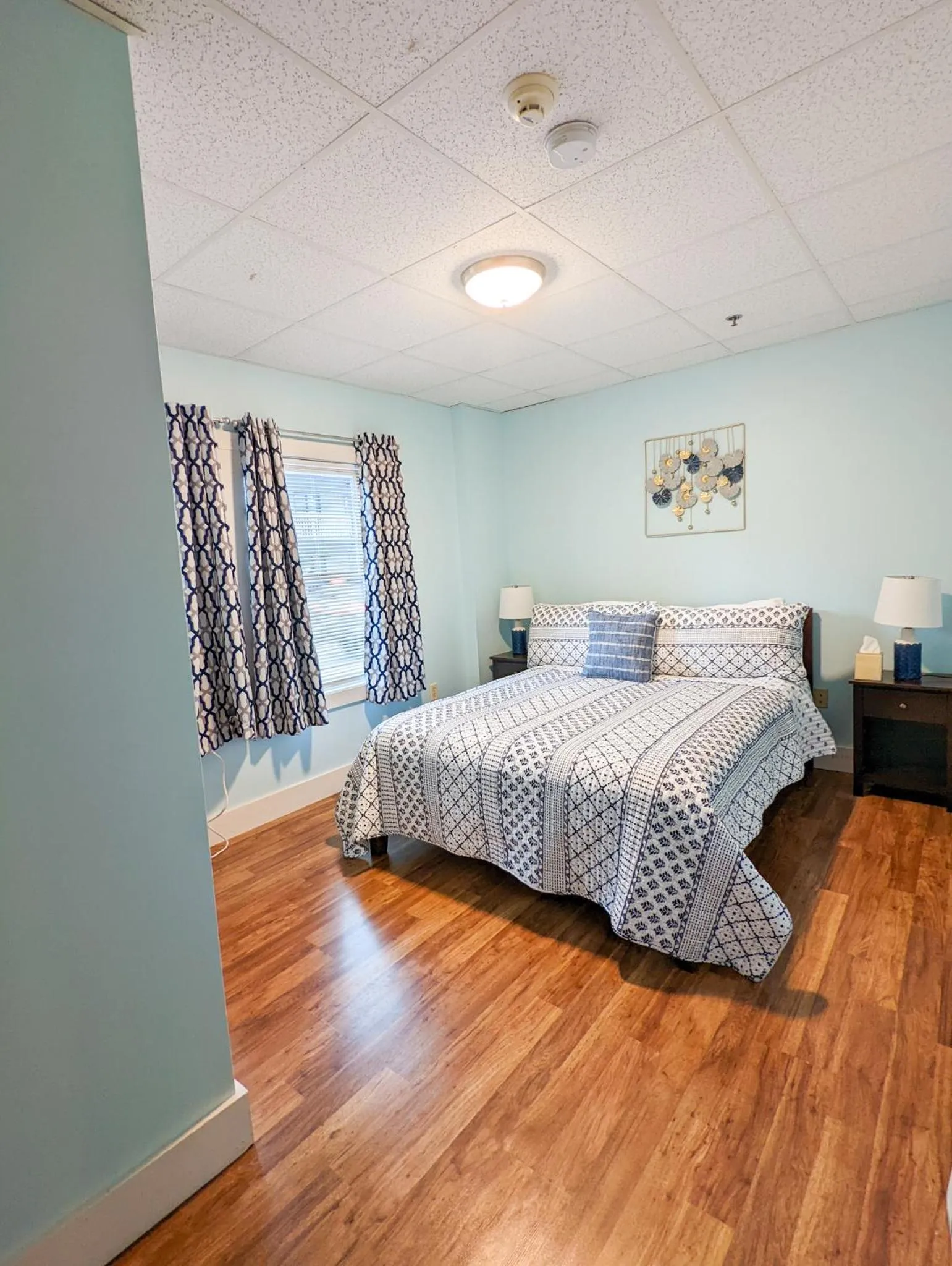 Bedroom, Bed in Downtown Apartments in Bar Harbor