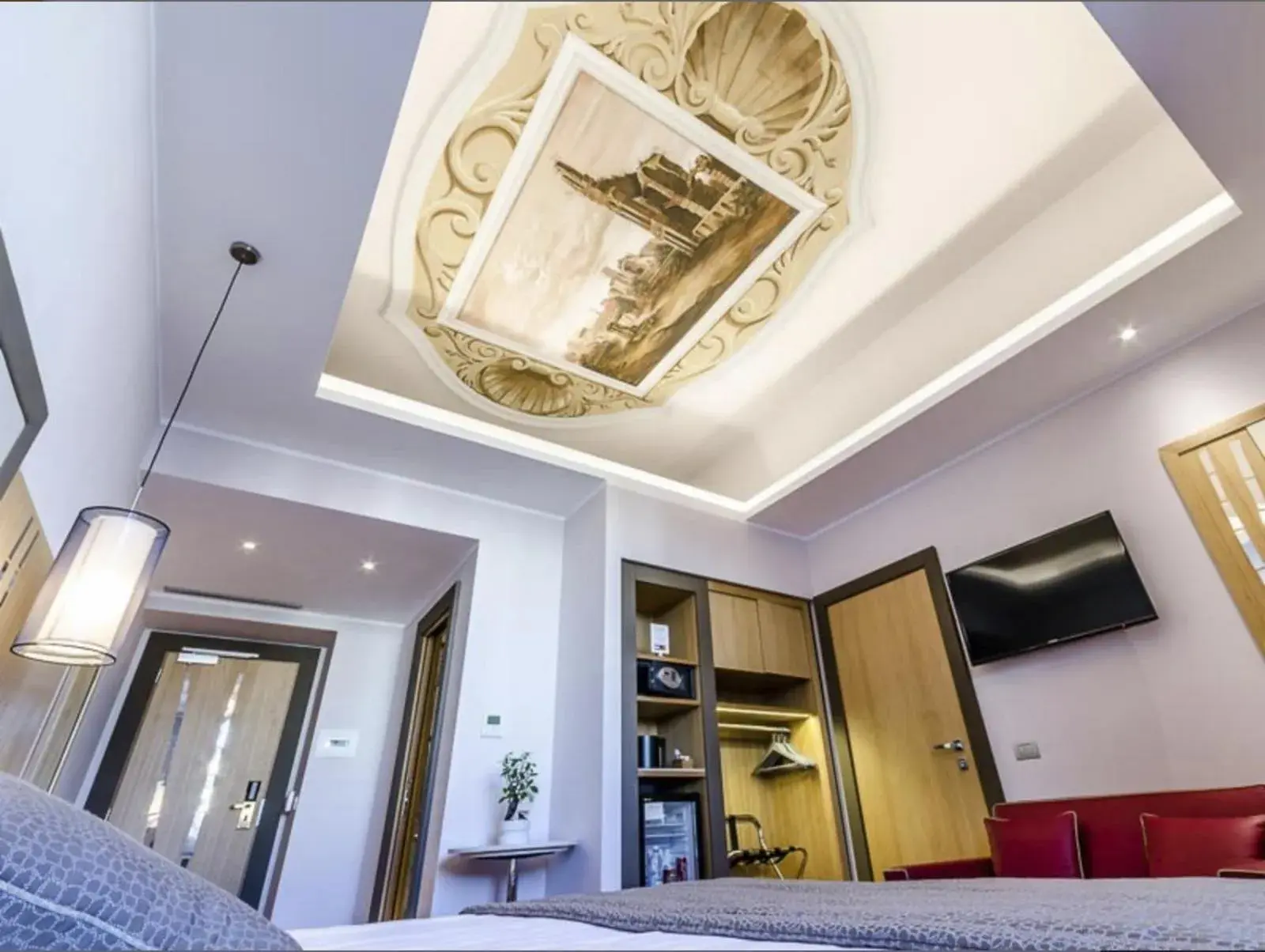 Decorative detail, Bed in Hotel Giolli Nazionale Decorative detail, Bed in Hotel Giolli Nazionale