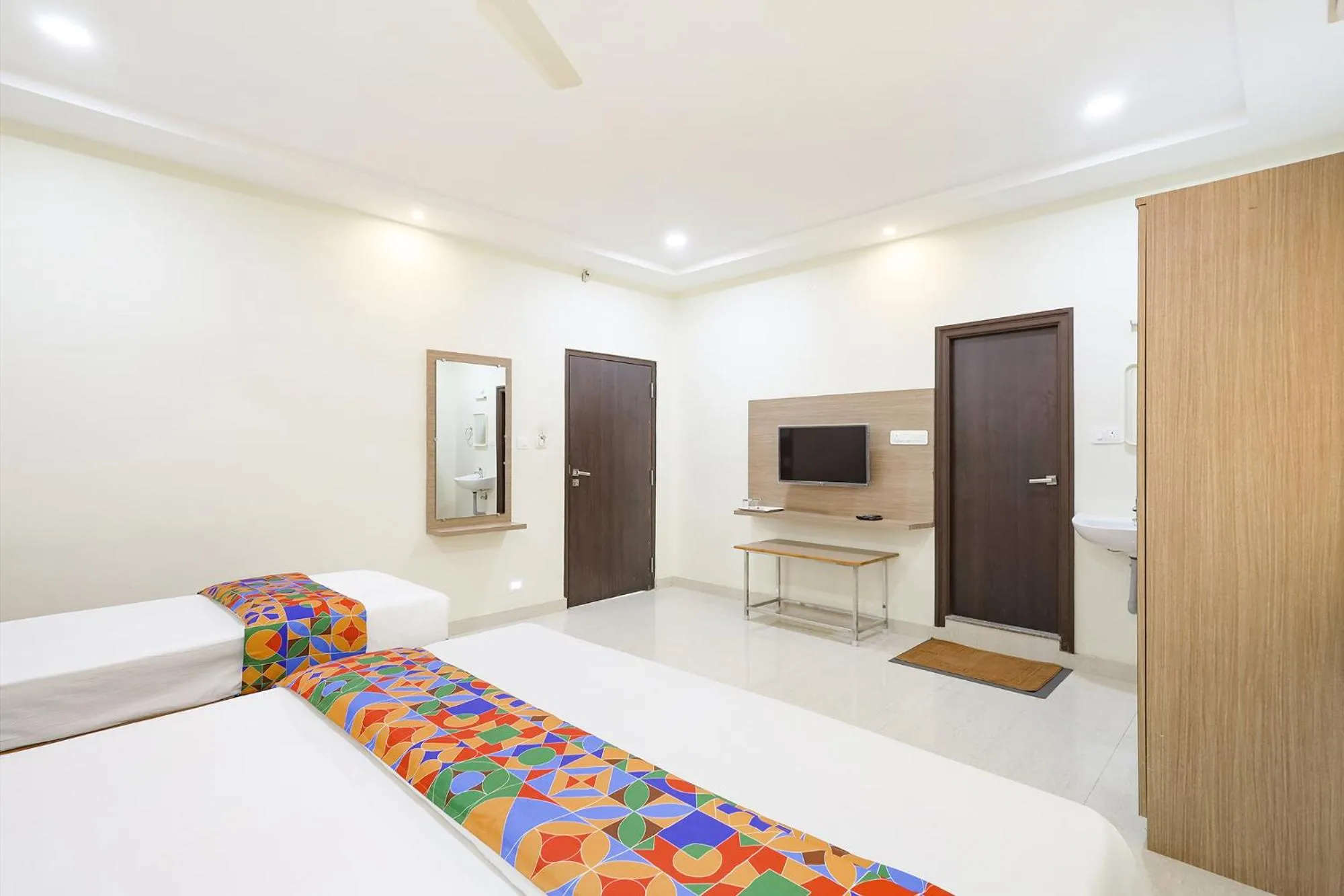 Bed in FabHotel Karthikeya Residency - 900m from Tirupati Bus Stand