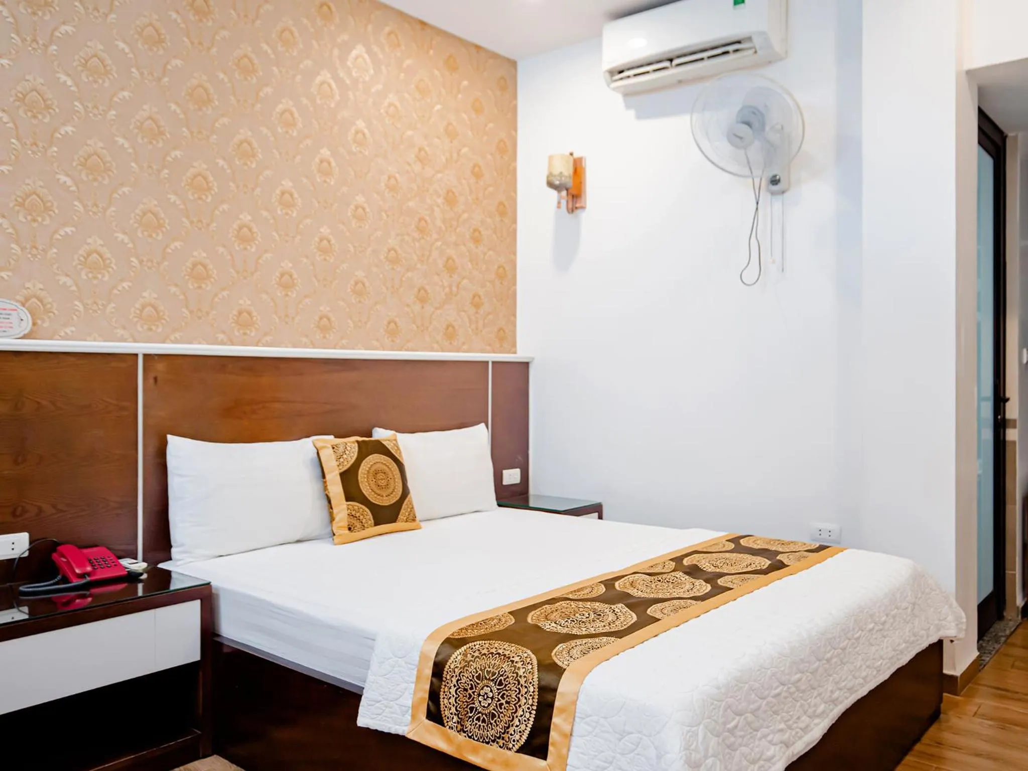 fireplace, Bed in Phuong Nam Luxury Hotel Long Bien