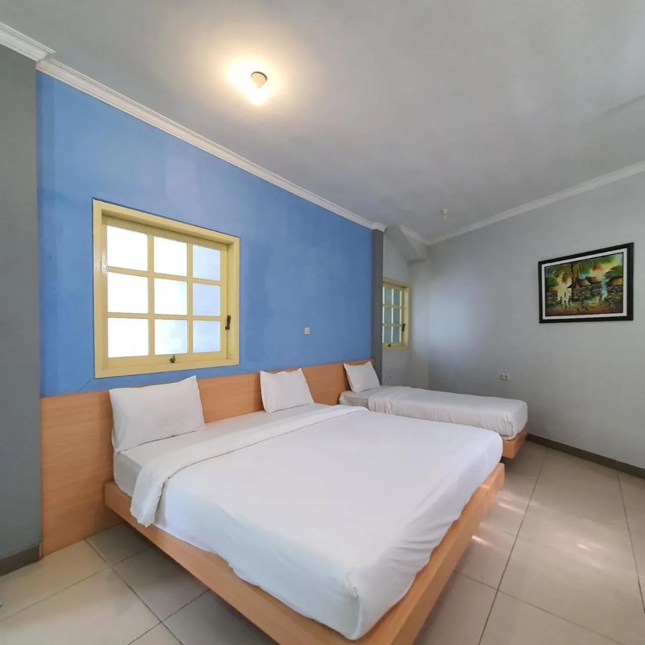 Bed in Candi Panggung Family Guest House Syariah