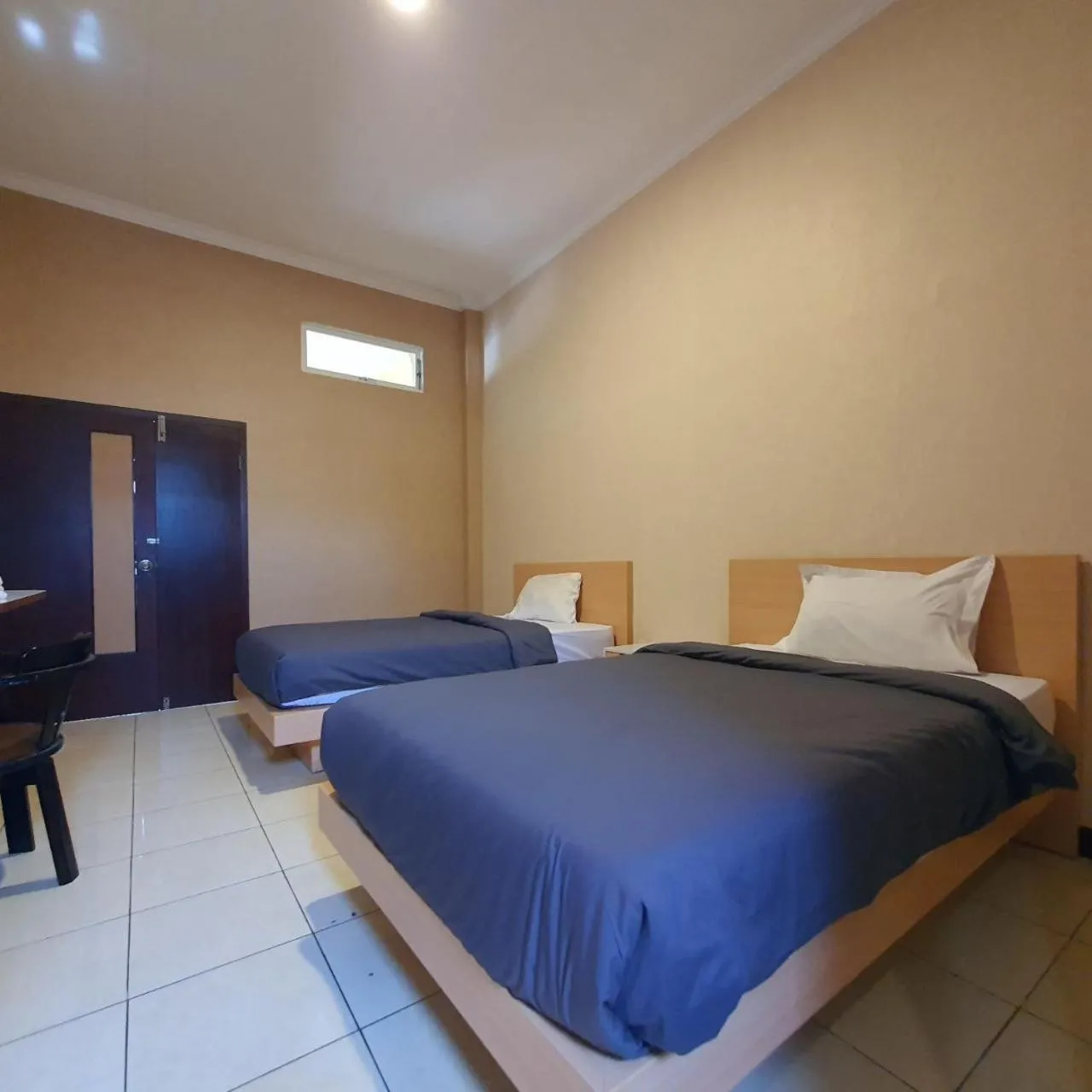 Bed in Candi Panggung Family Guest House Syariah