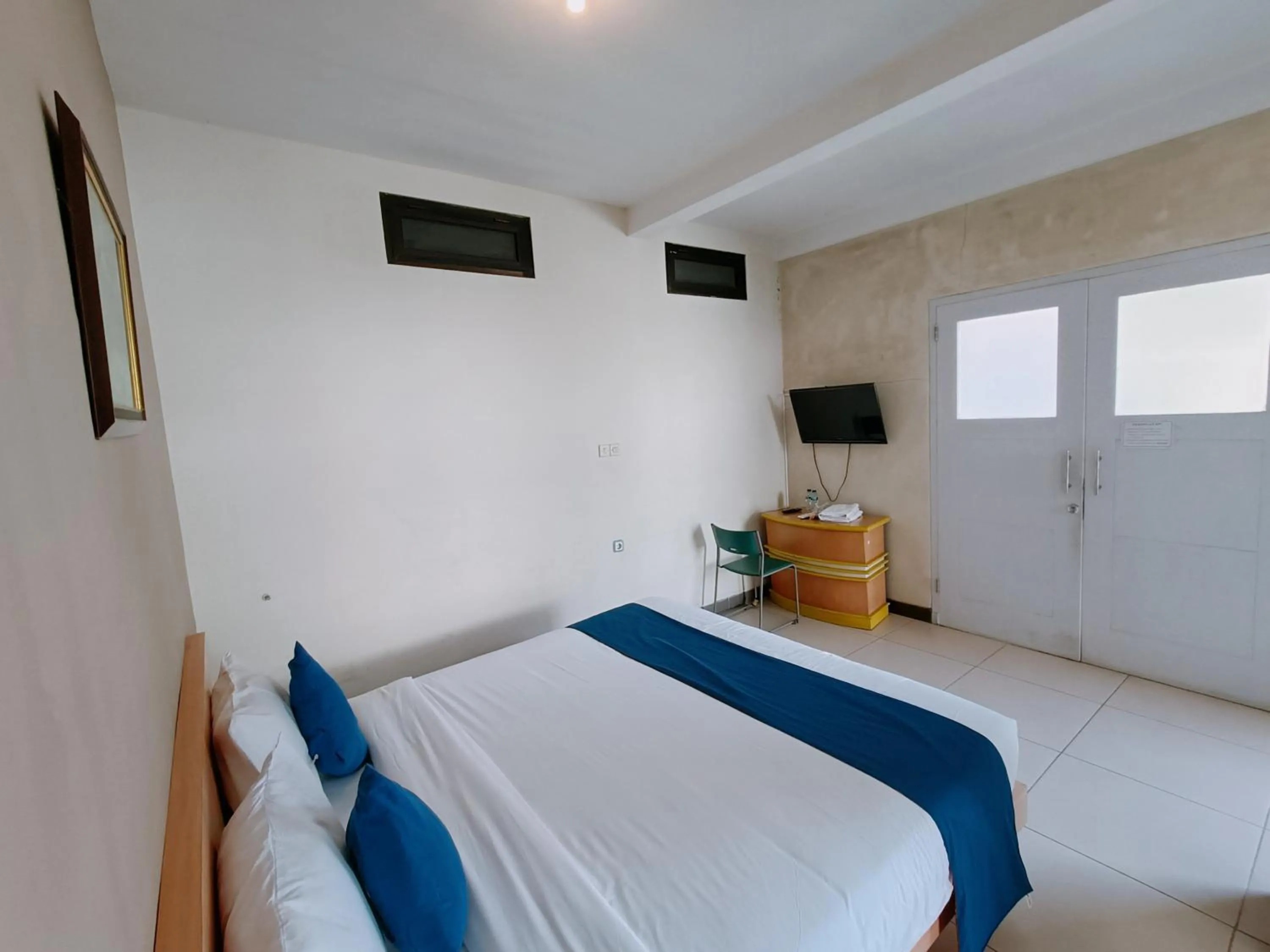 Bed in Candi Panggung Family Guest House Syariah