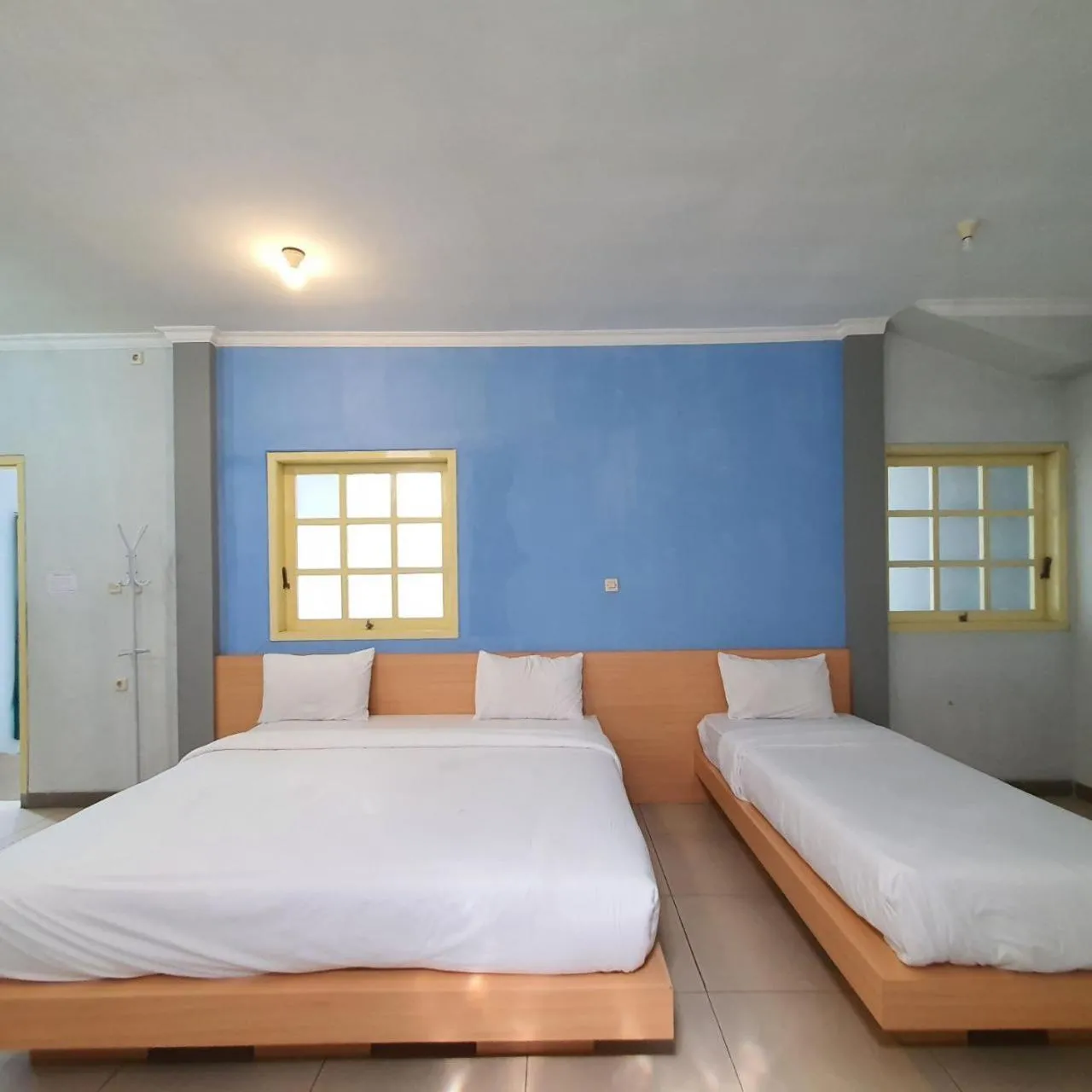 Bed in Candi Panggung Family Guest House Syariah