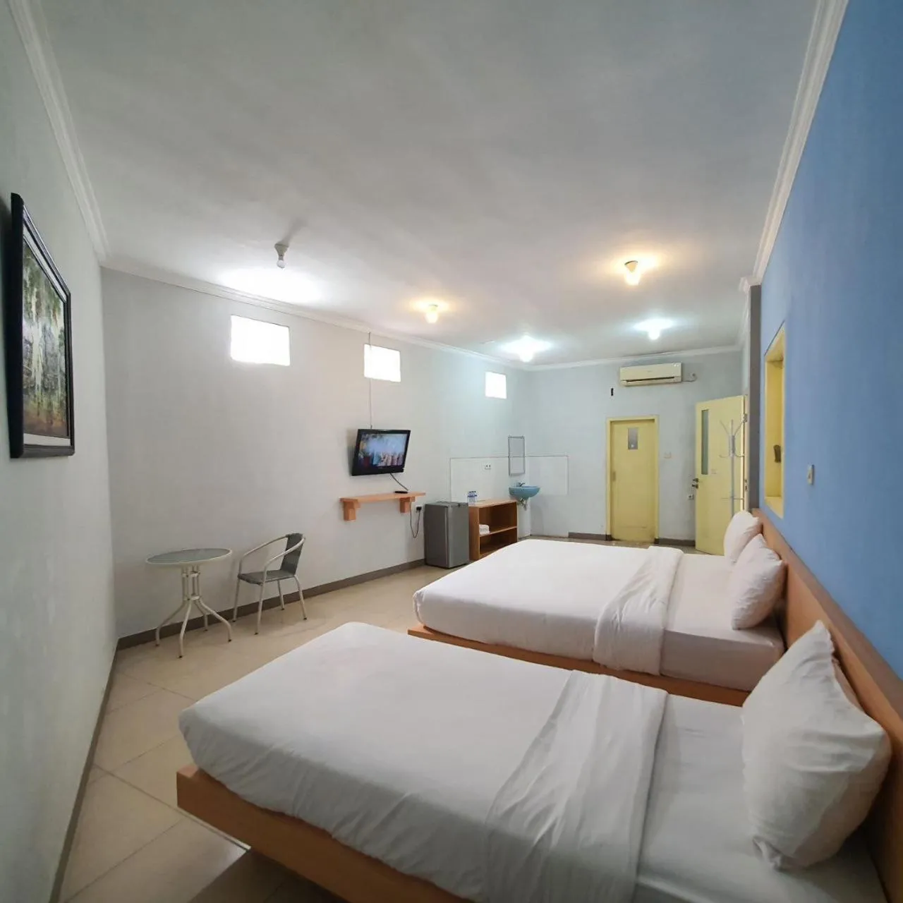Bed in Candi Panggung Family Guest House Syariah