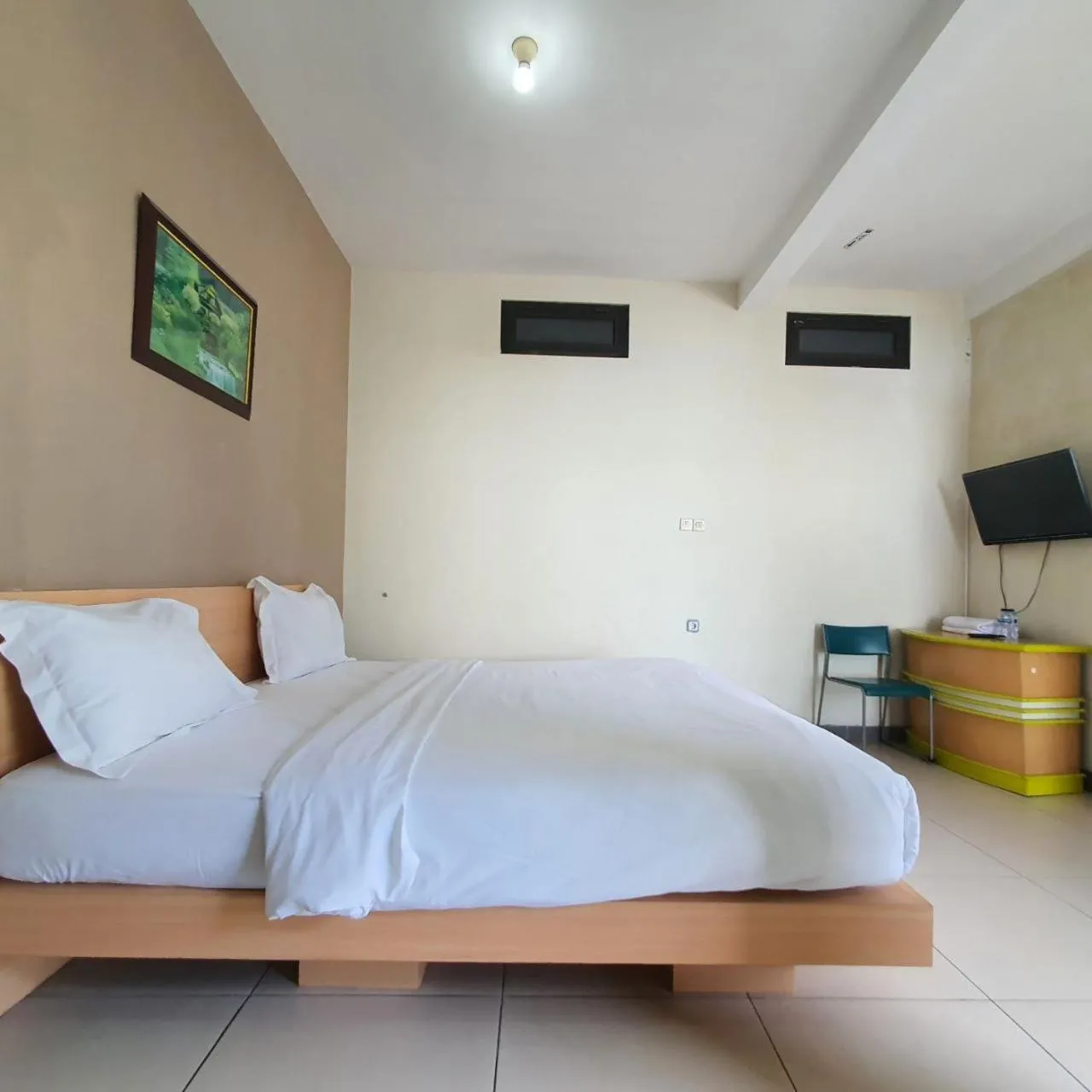 Bed in Candi Panggung Family Guest House Syariah