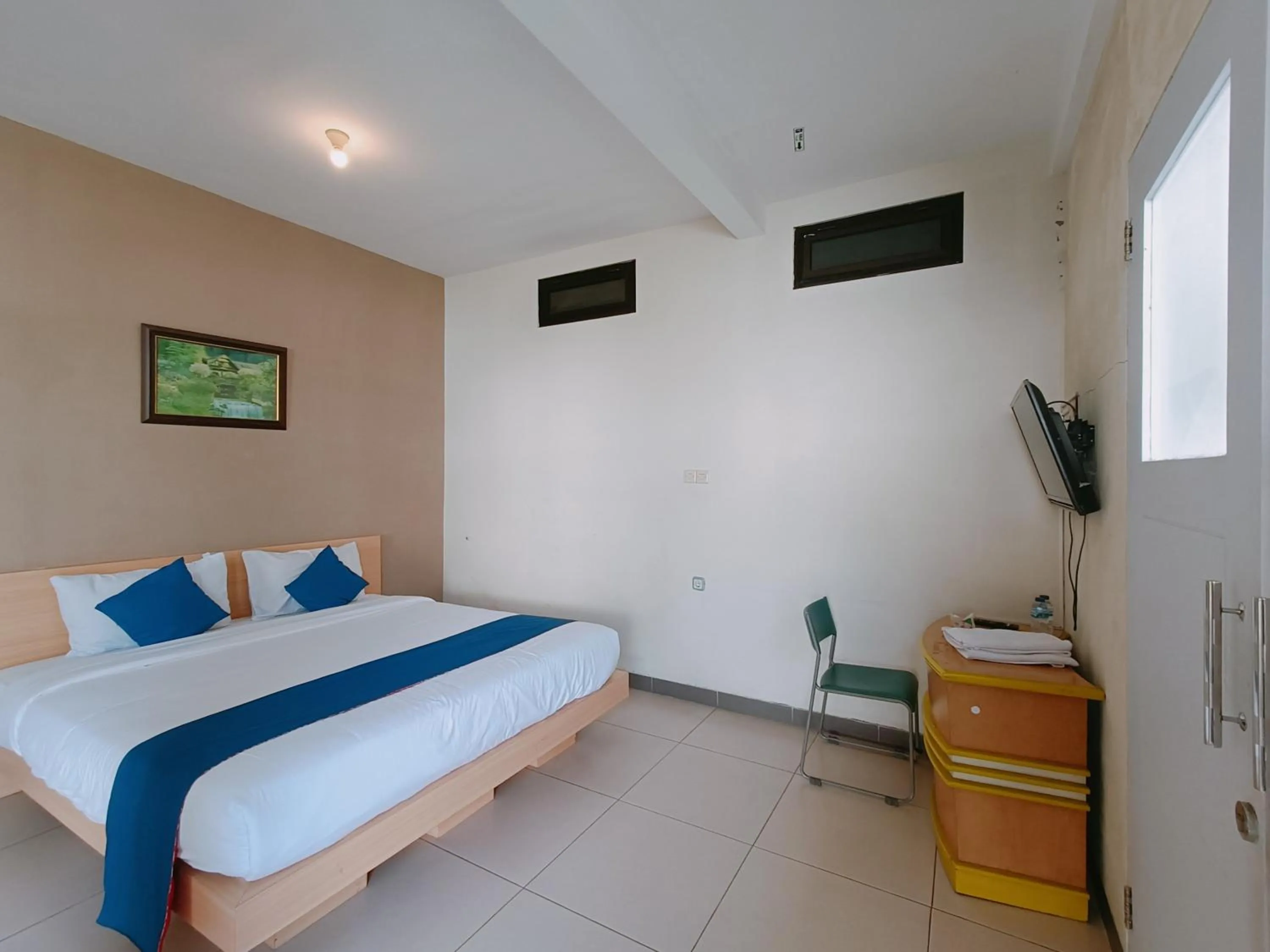 Bed in Candi Panggung Family Guest House Syariah