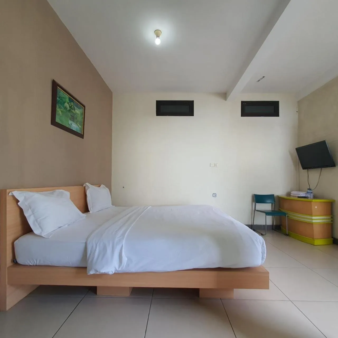 Bed in Candi Panggung Family Guest House Syariah