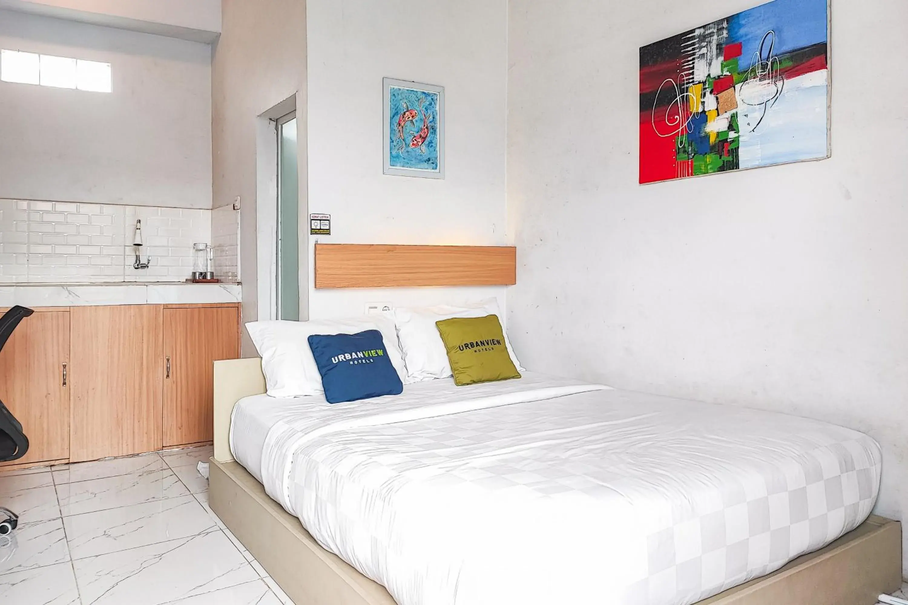 Bedroom, Bed in Urbanview Hotel Syariah at Waskita Residence Telanaipura Bedroom, Bed in Urbanview Hotel Syariah at Waskita Residence Telanaipura