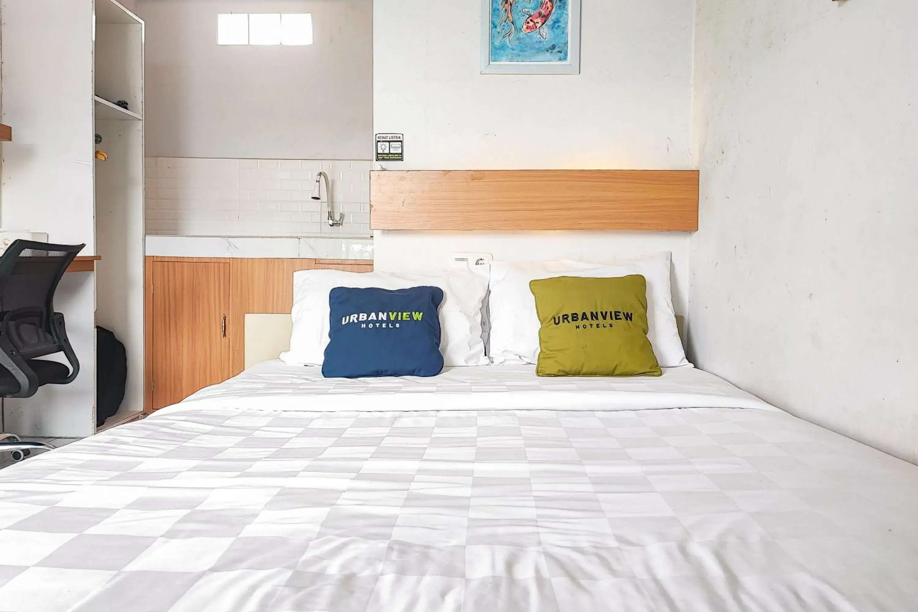 Bedroom, Bed in Urbanview Hotel Syariah at Waskita Residence Telanaipura Bedroom, Bed in Urbanview Hotel Syariah at Waskita Residence Telanaipura