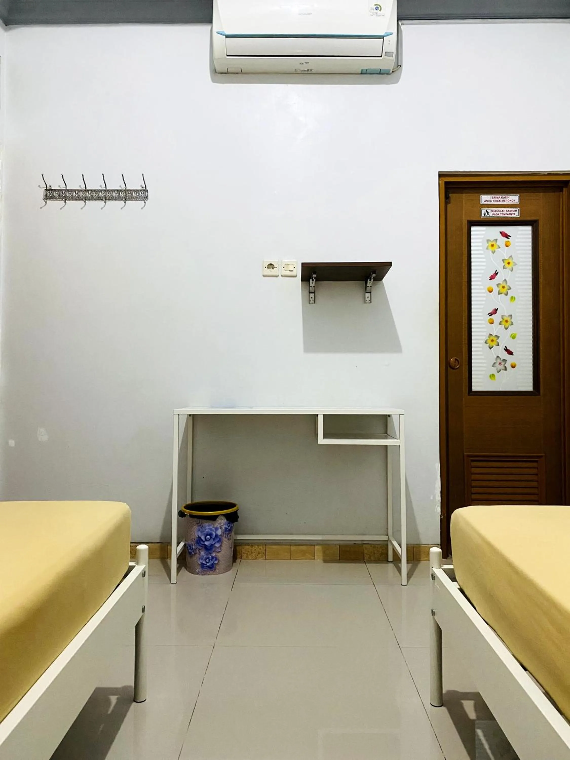 Bed in IB Homestay Syariah by Ecommerceloka