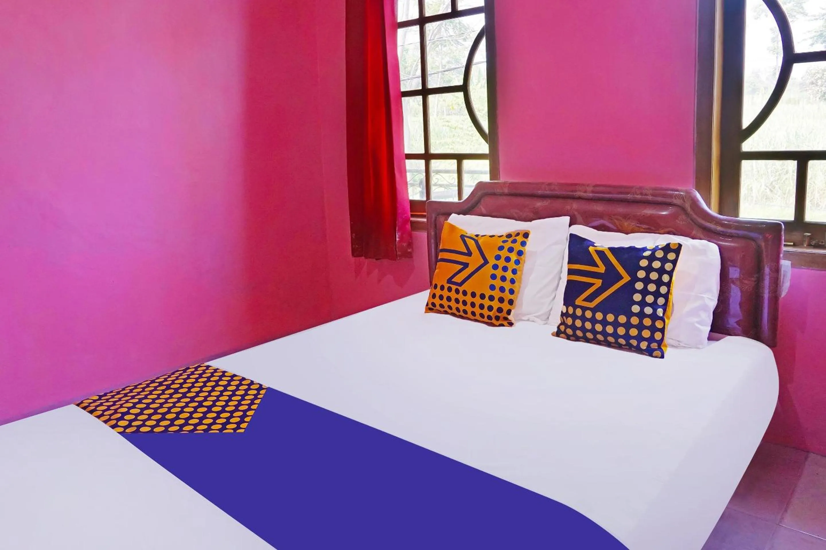 Bedroom in SPOT ON 91527 As-sakinah Homestay Syariah