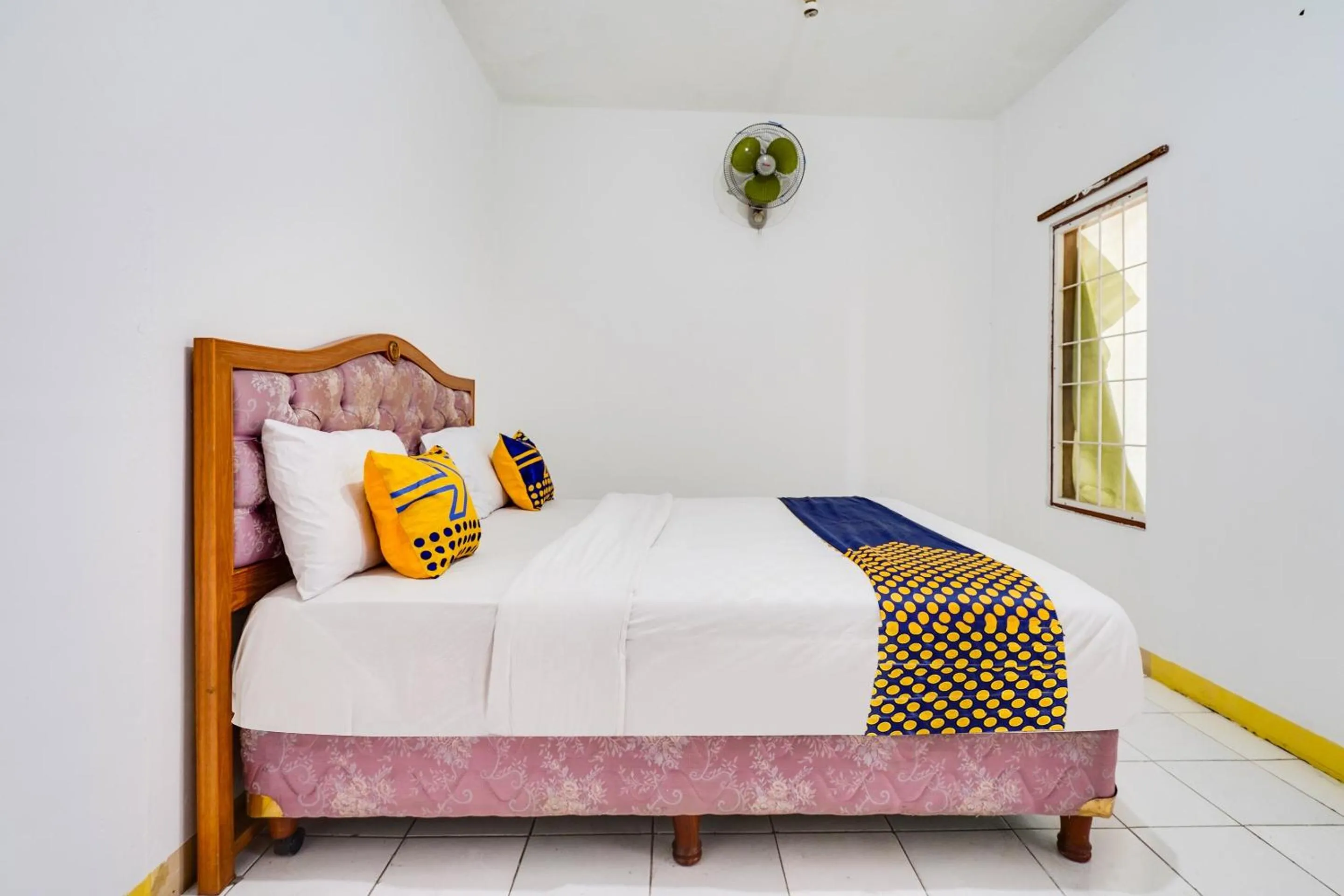 Bedroom in OYO 91546 Dewi Sudirman Homestay