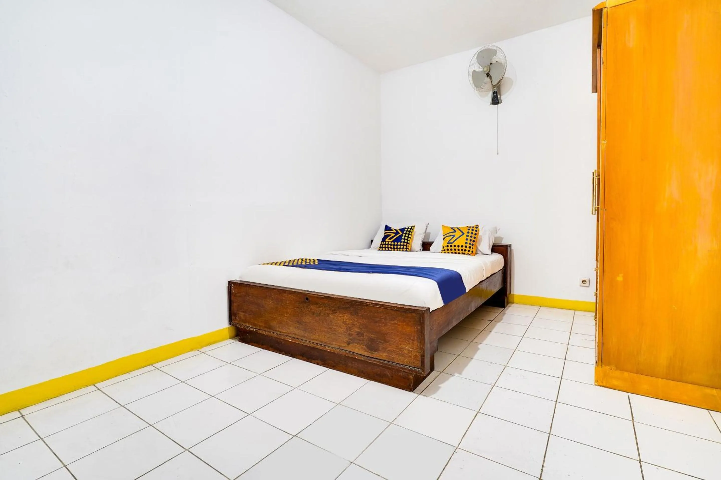 Bedroom in OYO 91546 Dewi Sudirman Homestay