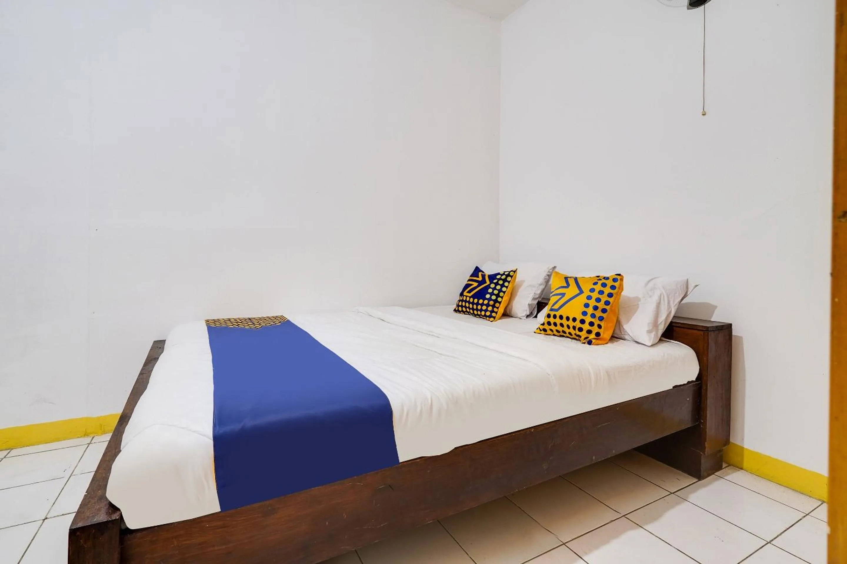 Bedroom in OYO 91546 Dewi Sudirman Homestay