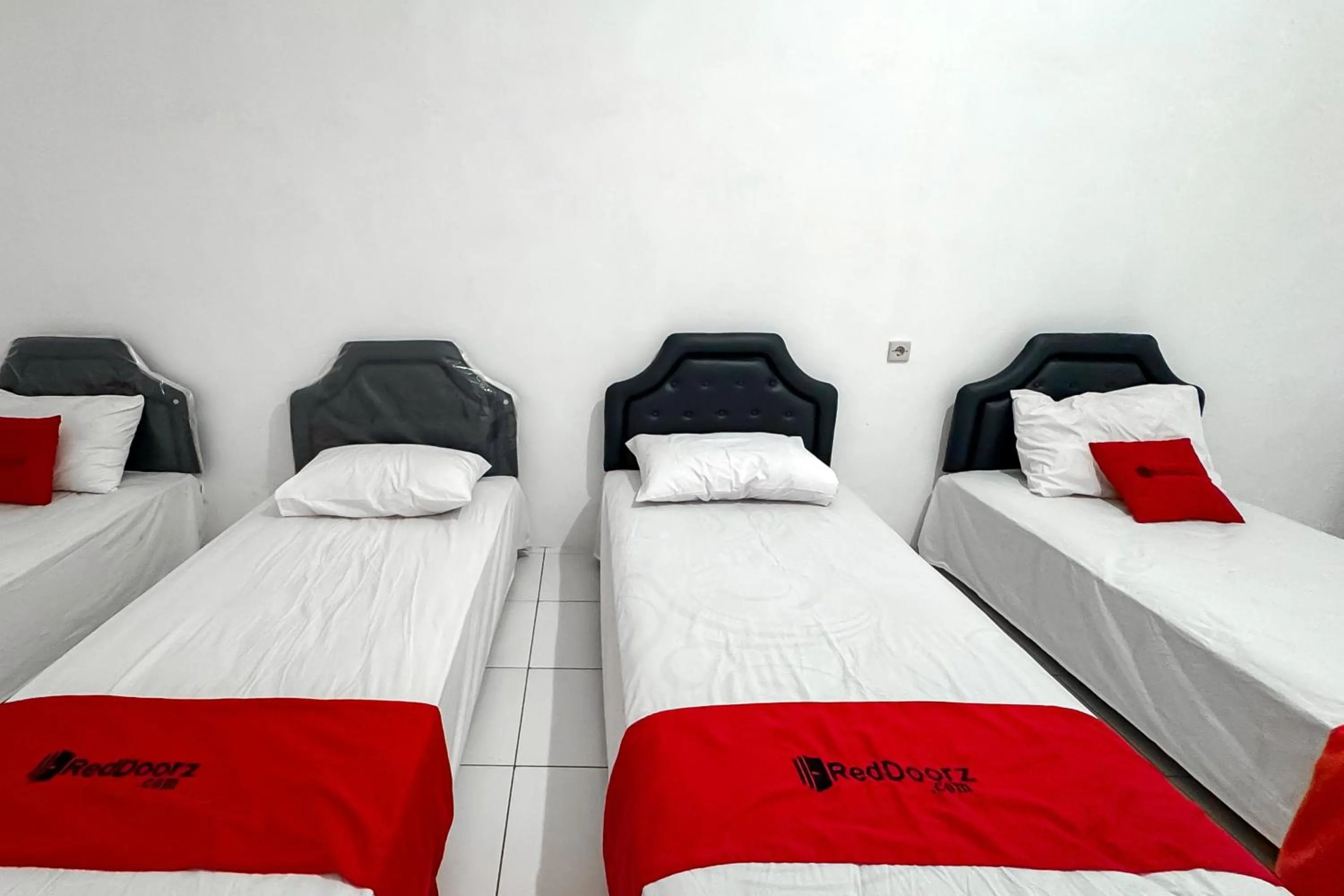 Bedroom, Bed in RedDoorz Syariah at Neu Hostel Cisarua Lembang