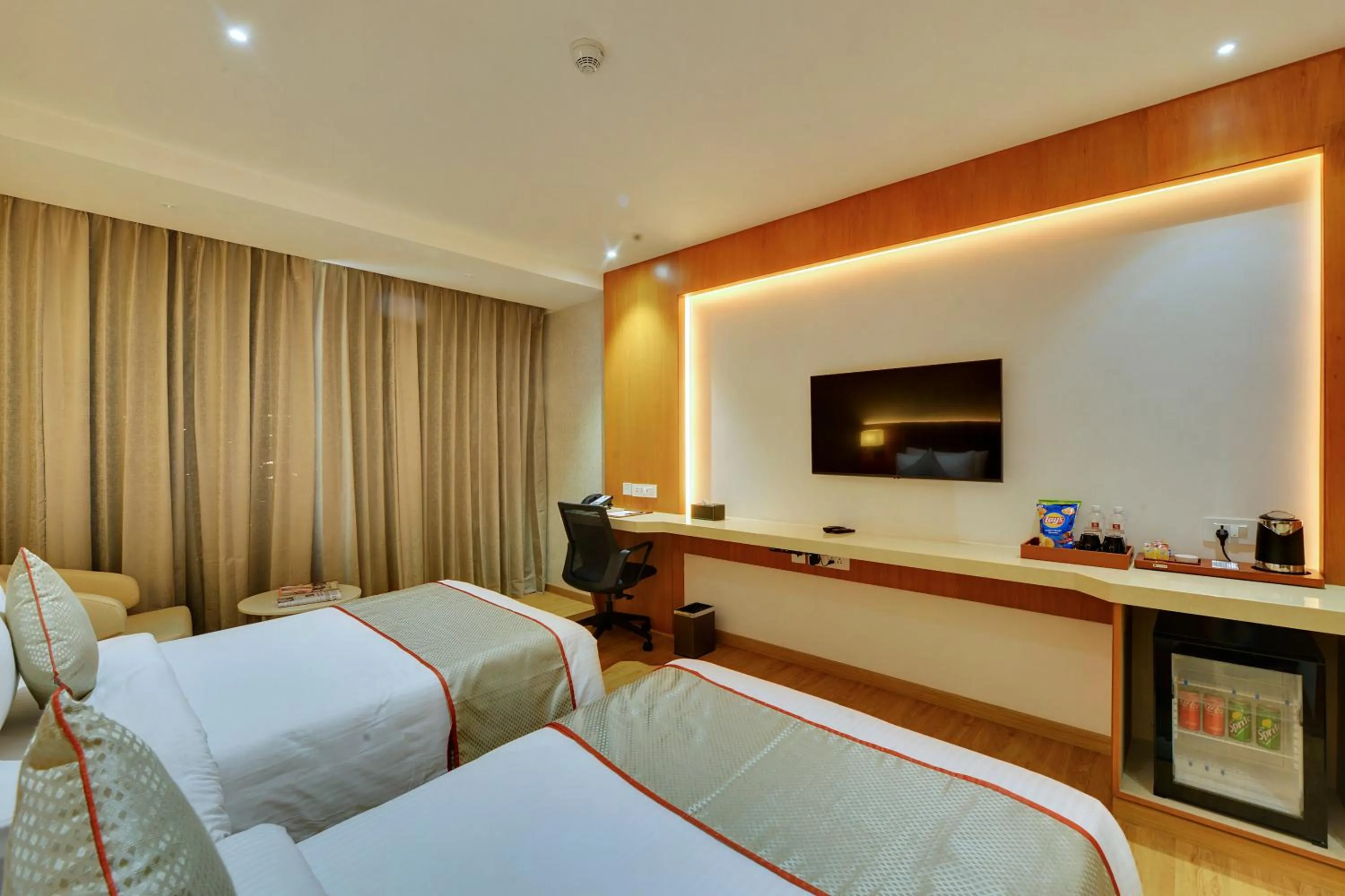Bed in Clarion Hotel Bangalore