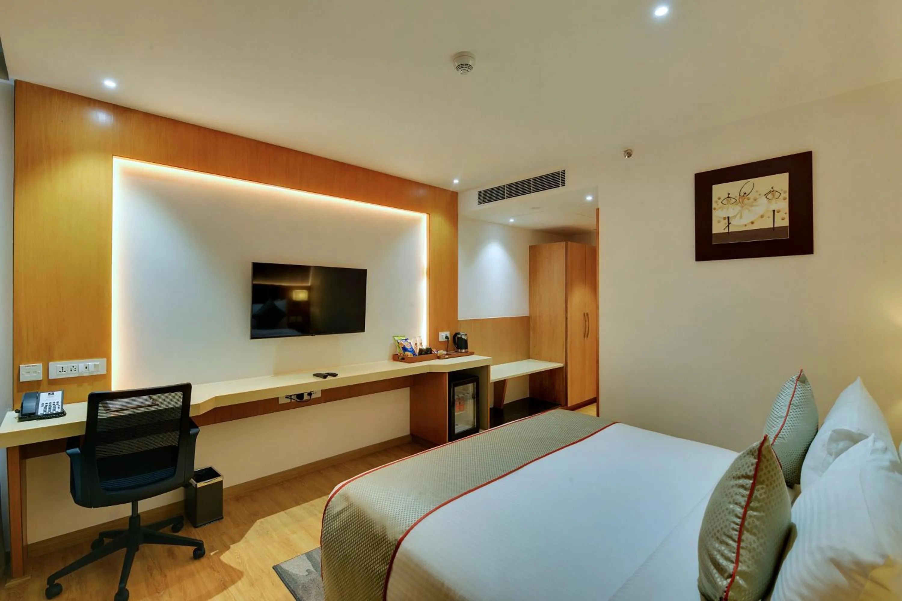 Bed in Clarion Hotel Bangalore