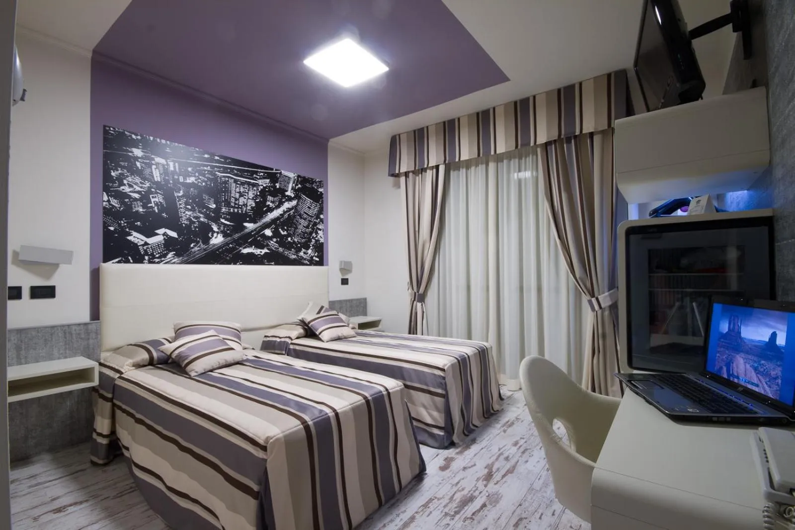 Bed in Hotel Le Palme