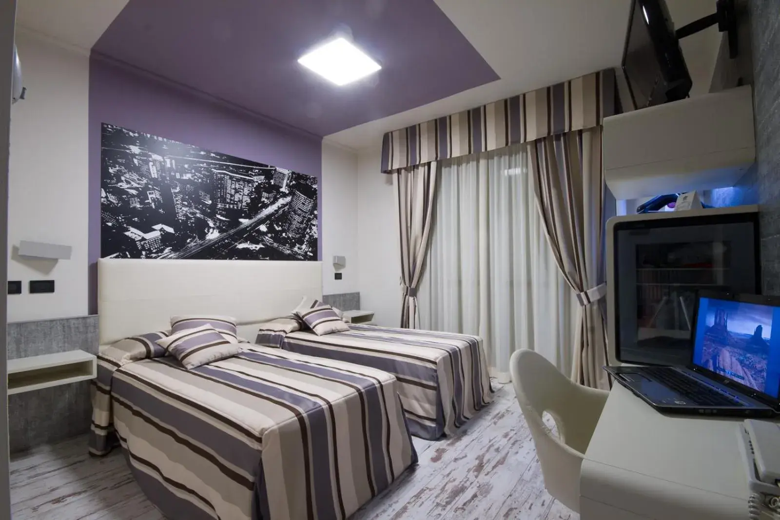 Bed in Hotel Le Palme Bed in Hotel Le Palme