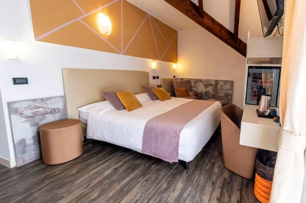 Bed in Hotel Le Palme