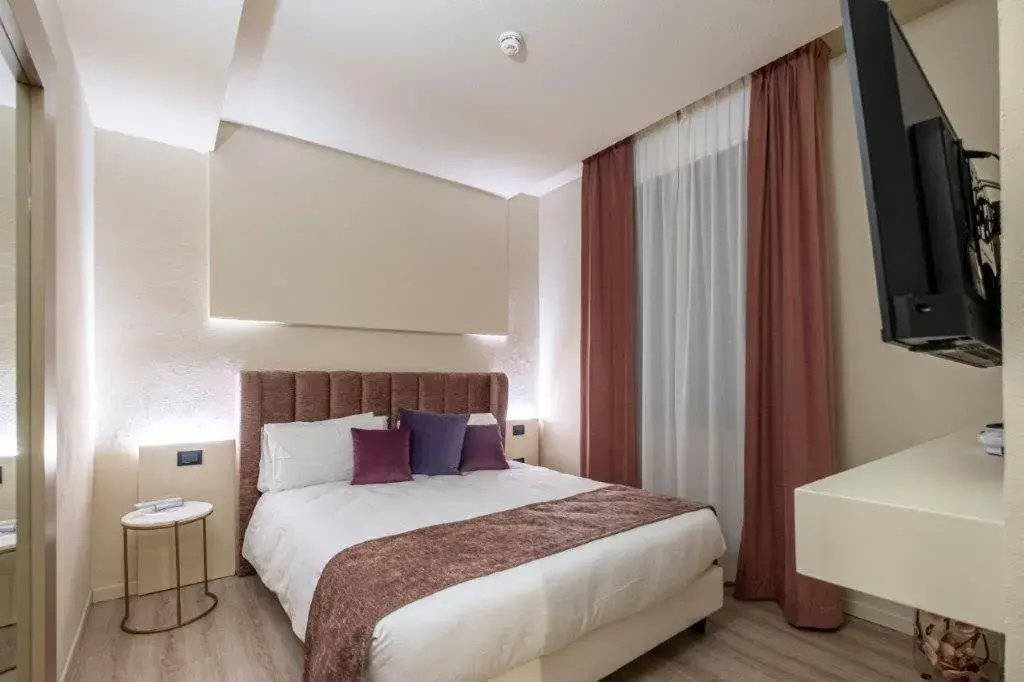 Bed in Hotel Le Palme Bed in Hotel Le Palme