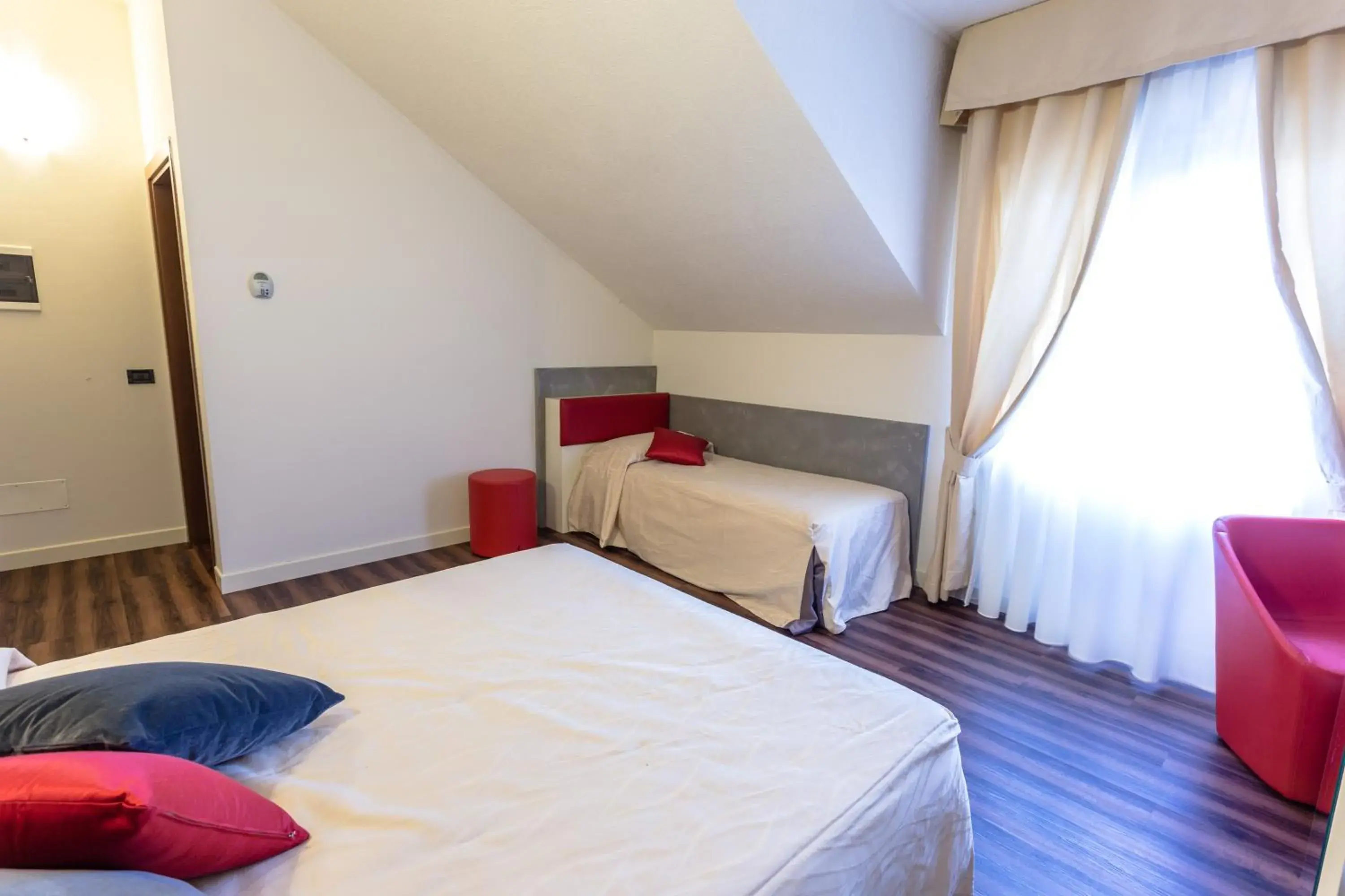 Bed in Hotel Le Palme Bed in Hotel Le Palme