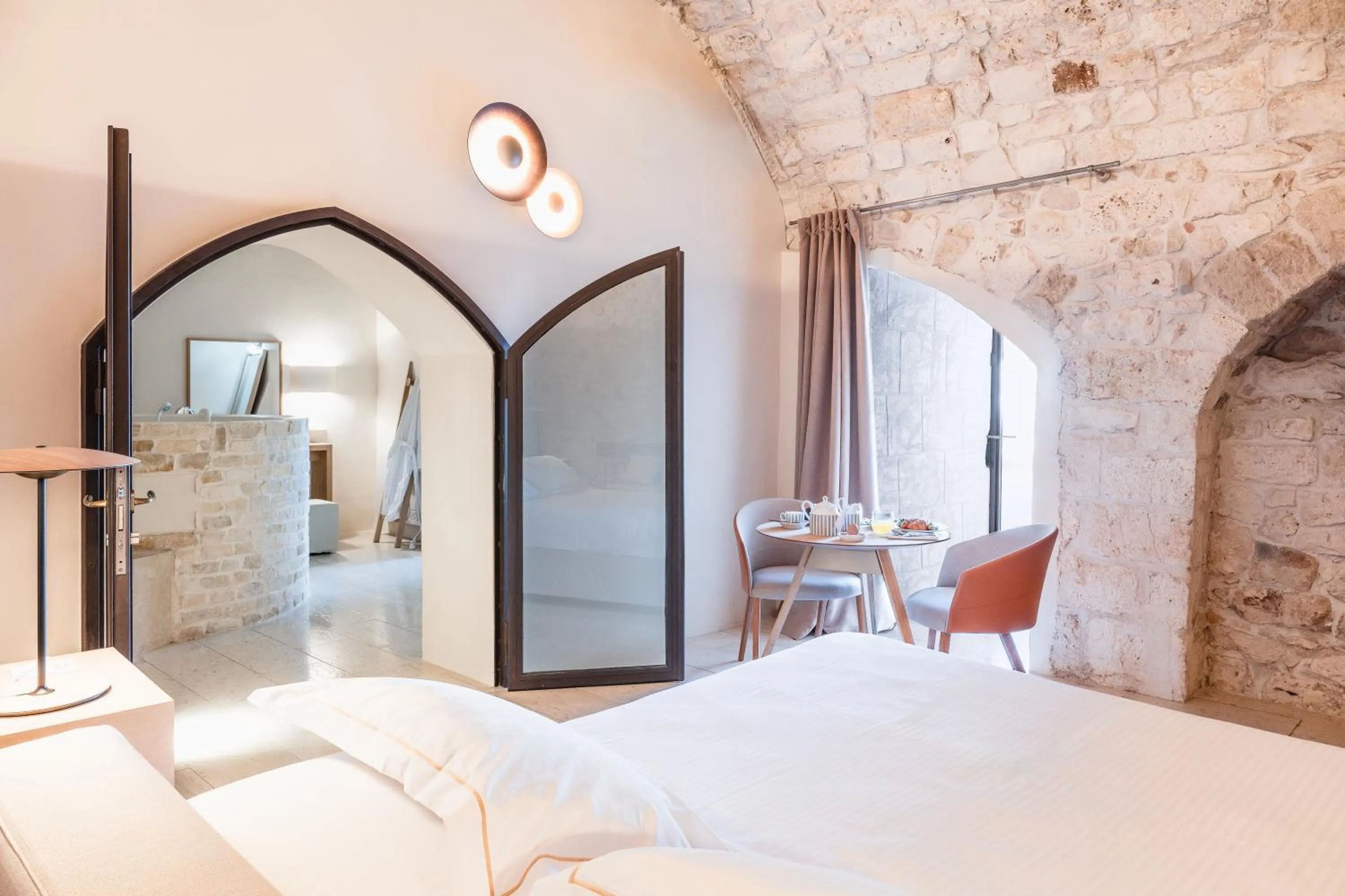 Seating area, Bed in La Sommità Relais & Chateaux