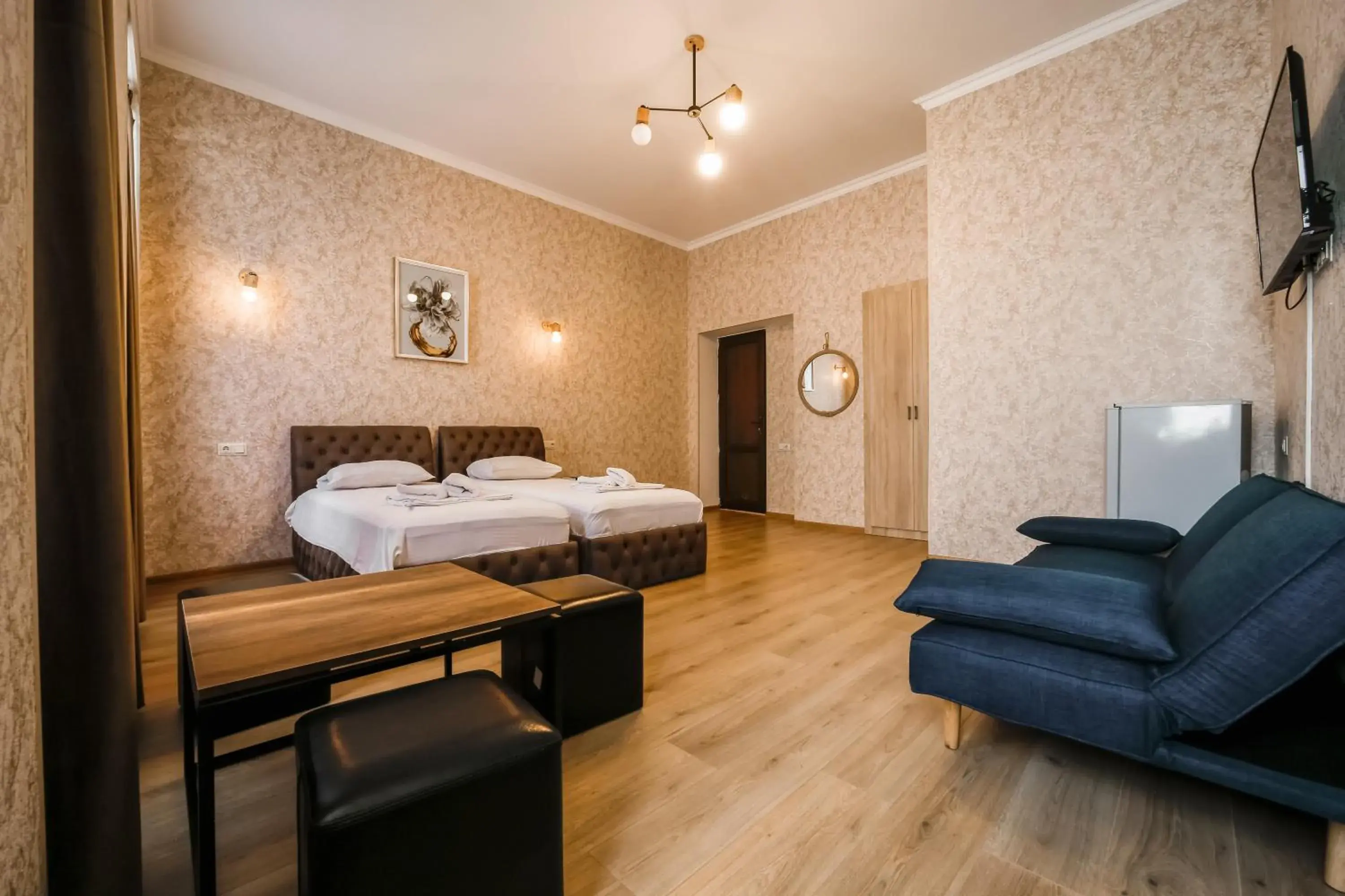 Classic Triple Room in Hotel Guri Classic Triple Room in Hotel Guri