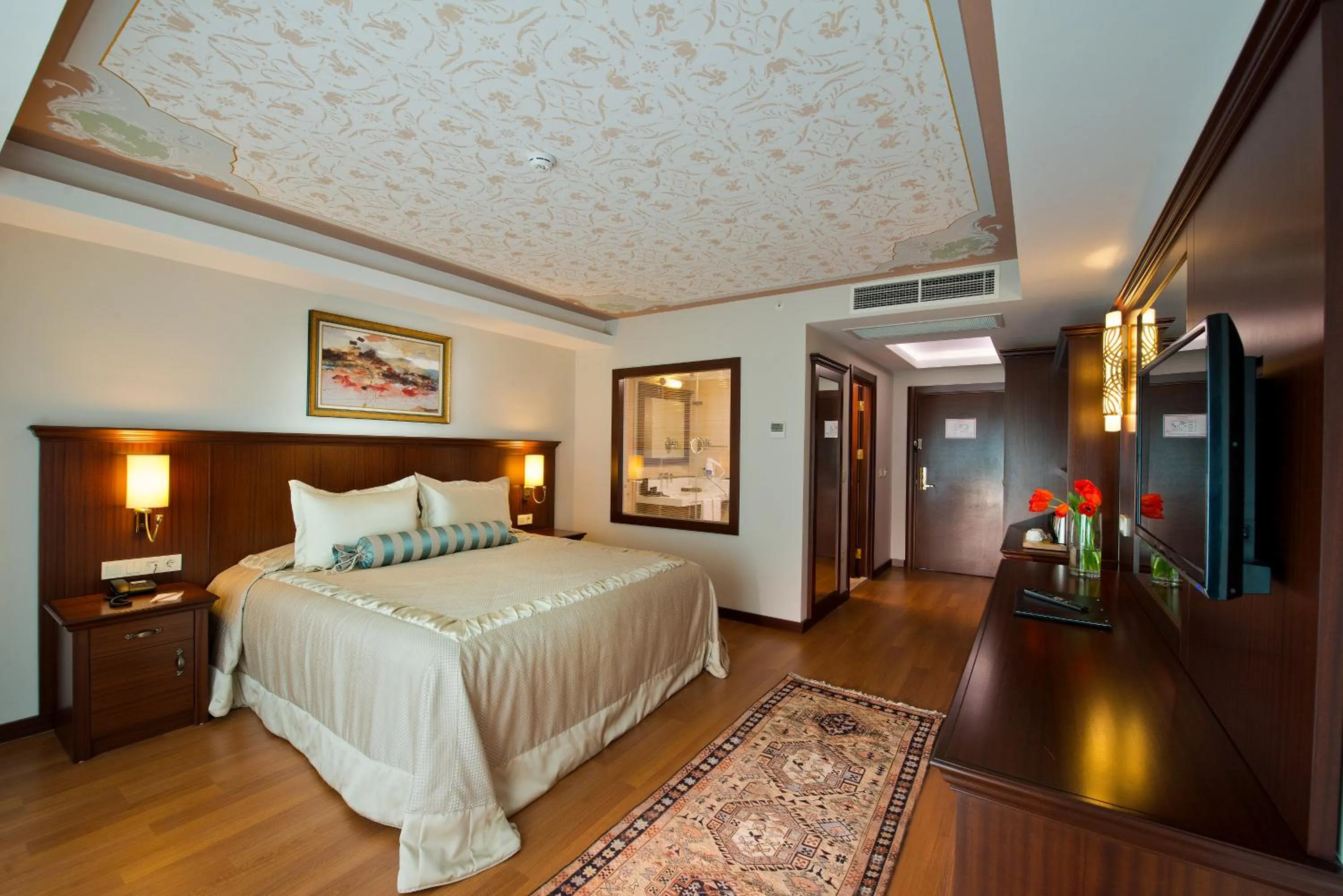 Bed in Prime Boutique Hotel