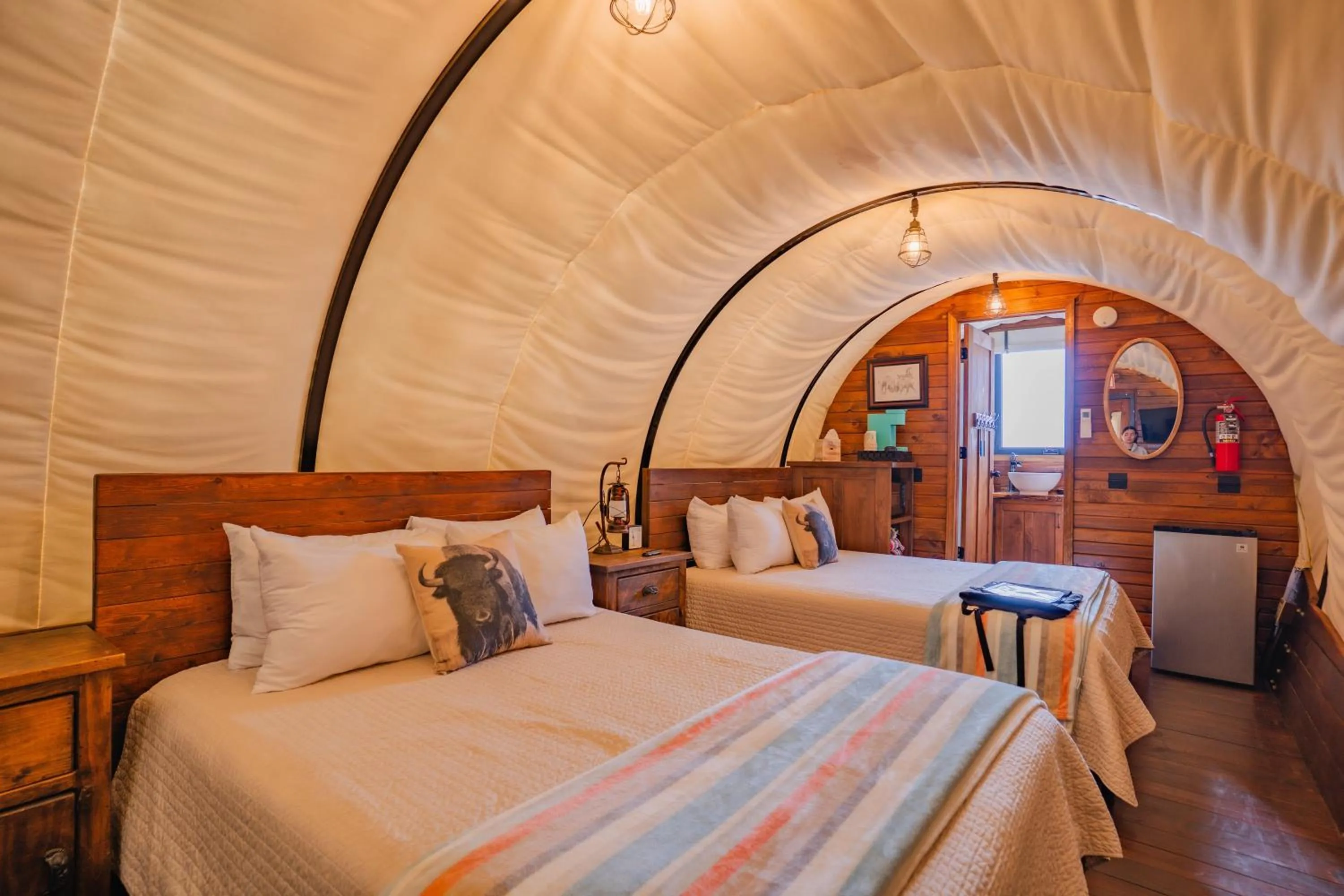 Bed in Zion White Bison Glamping & RV Resort