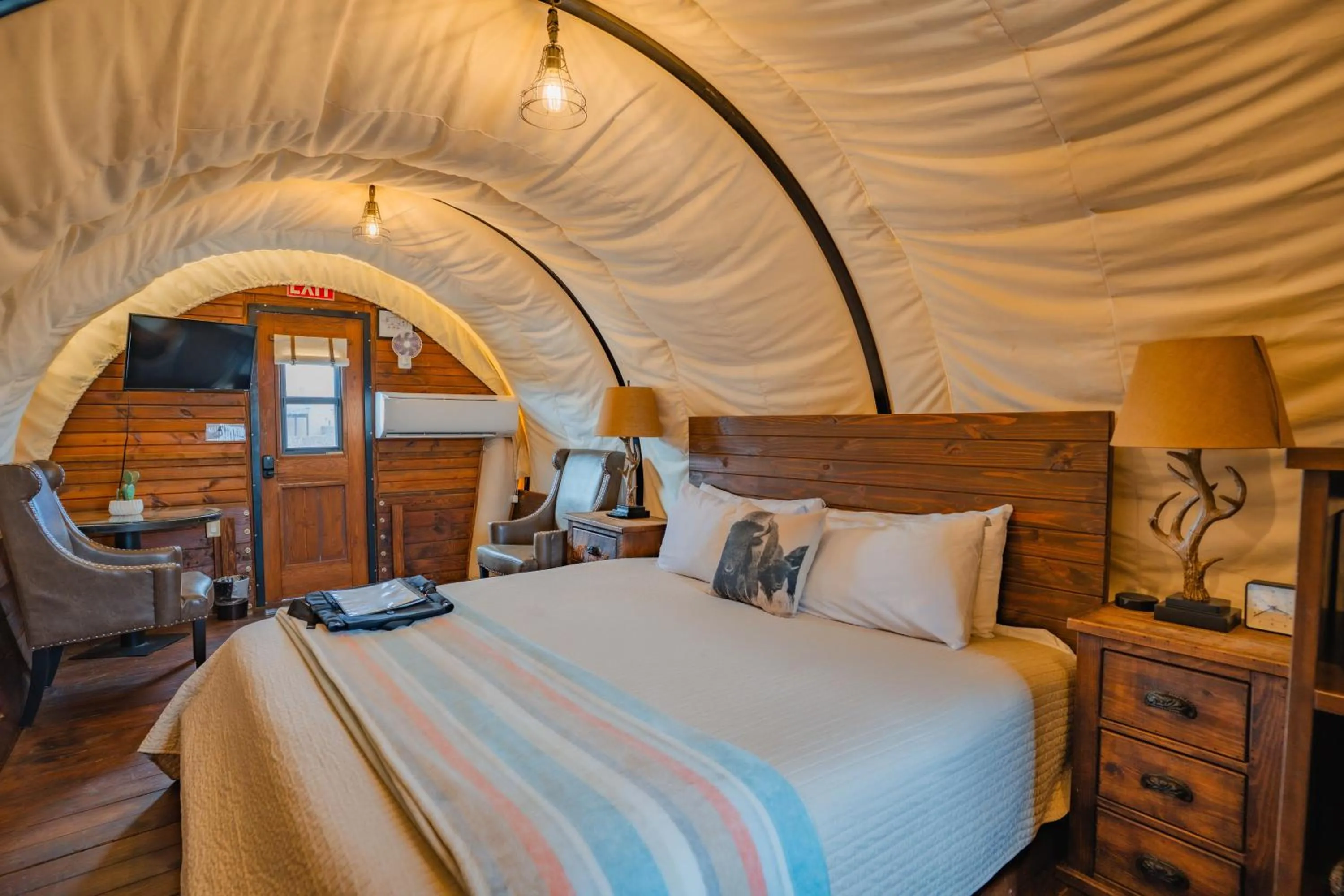 Bed in Zion White Bison Glamping & RV Resort