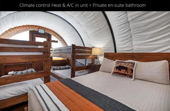 Bed in Zion White Bison Glamping & RV Resort