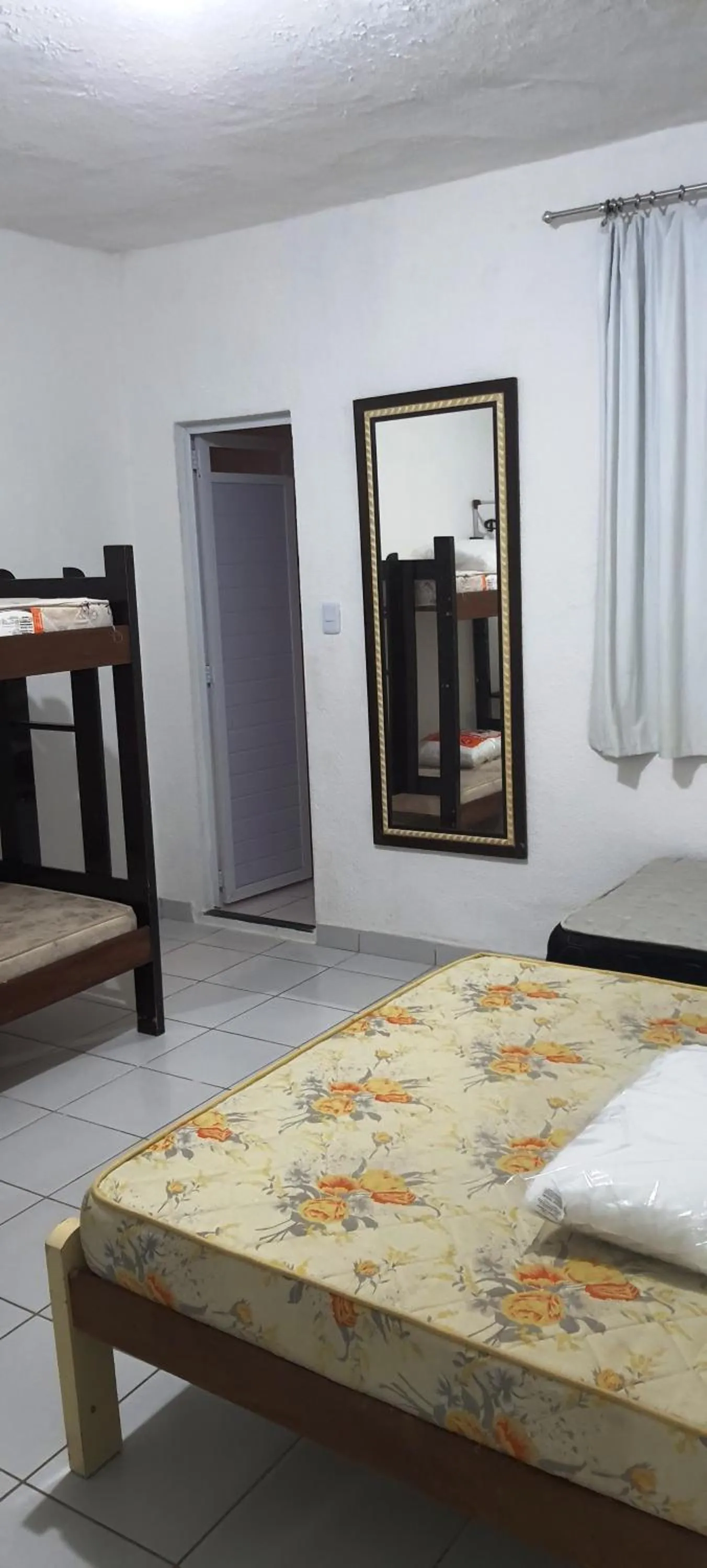 Bed in Pousada Savoy