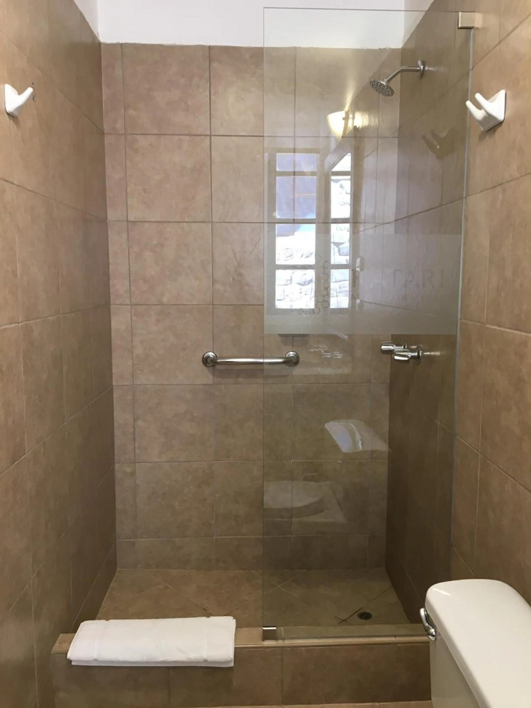 Shower in Katari at Plaza de Armas Cusco