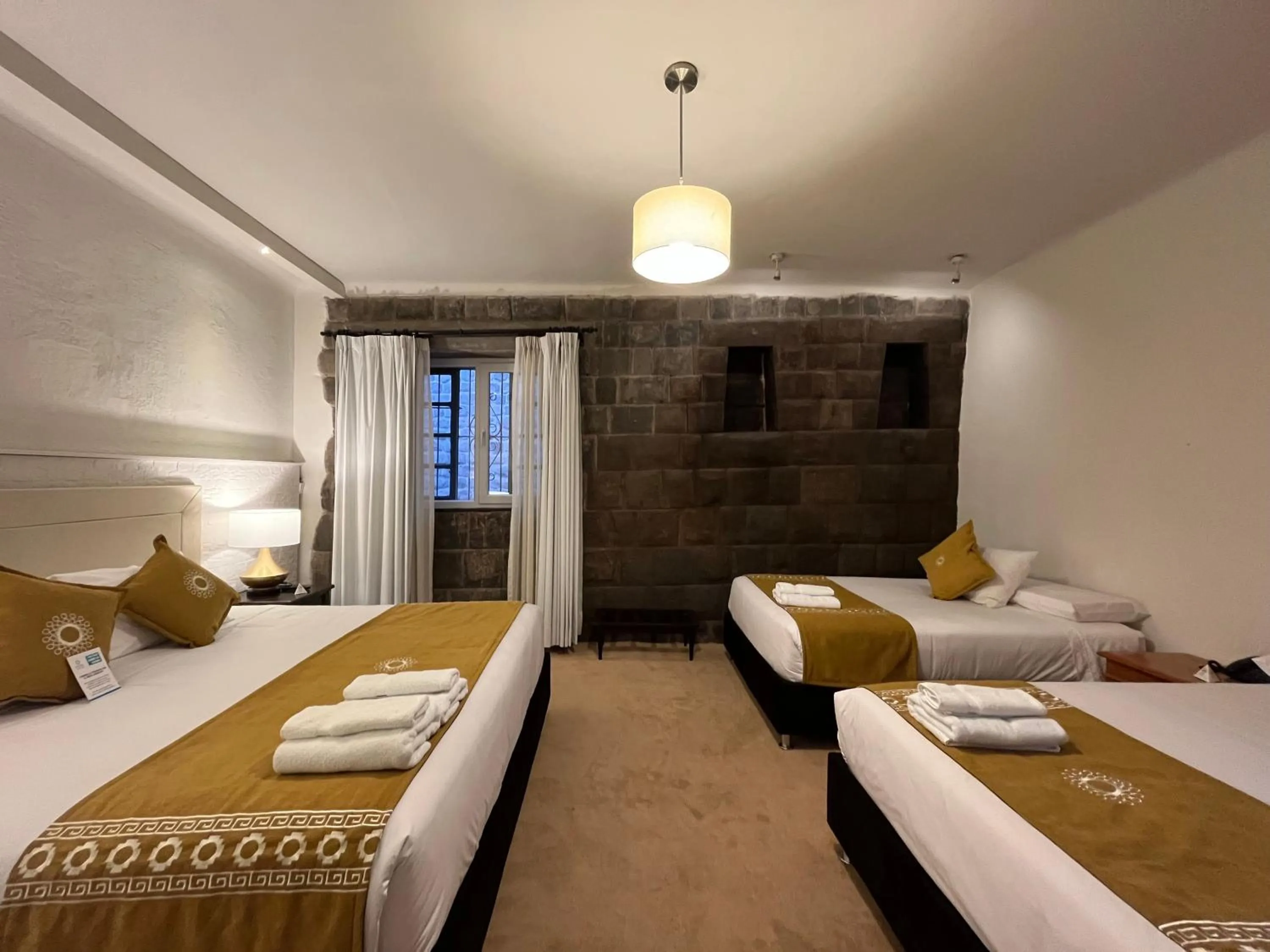 Photo of the whole room, Bed in Katari at Plaza de Armas Cusco