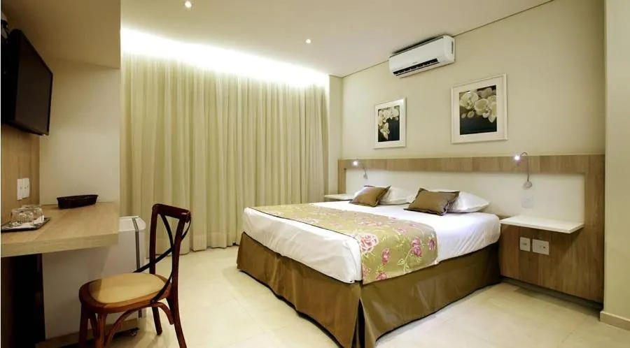 Photo of the whole room, Bed in Lirio D'Água Hotel