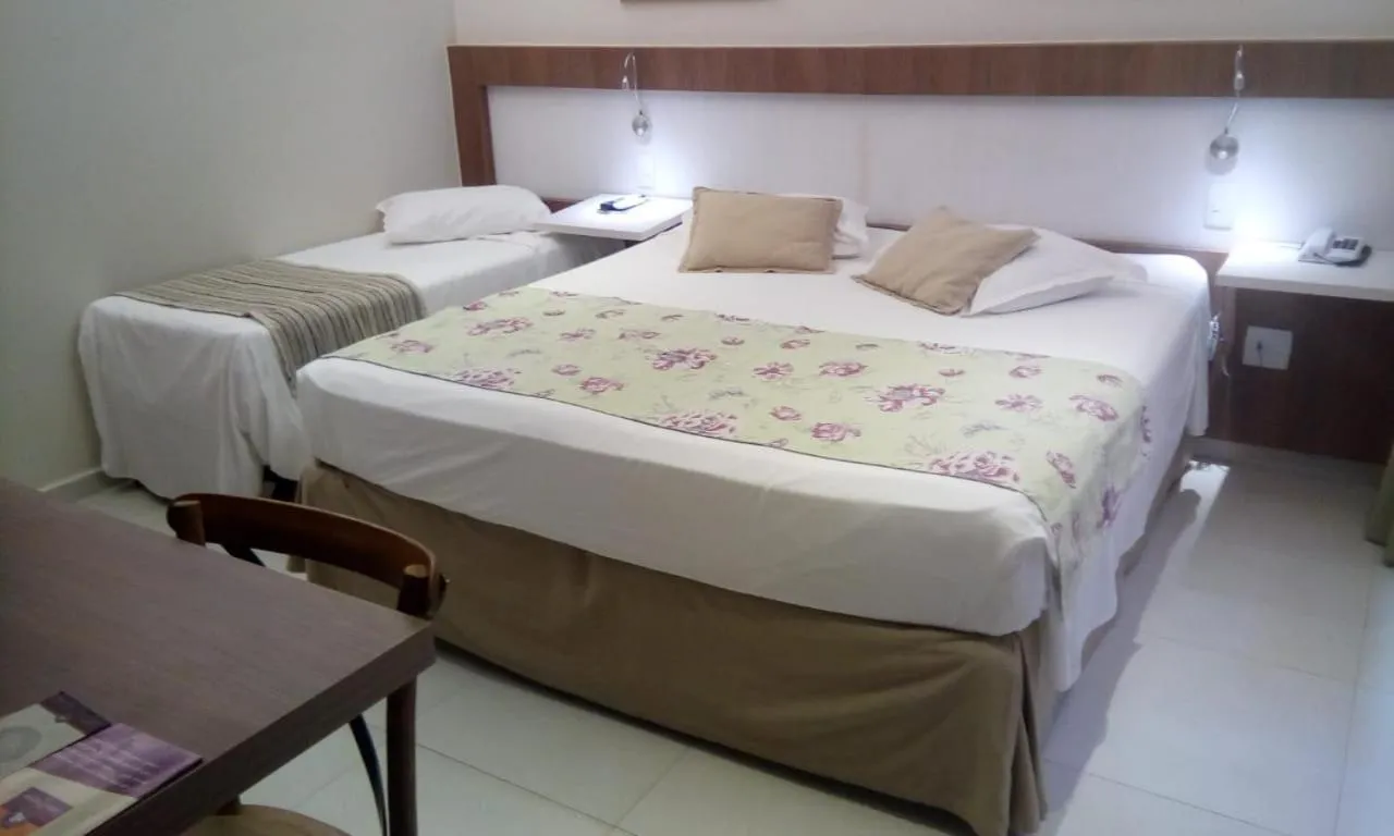 Bed in Lirio D'Água Hotel