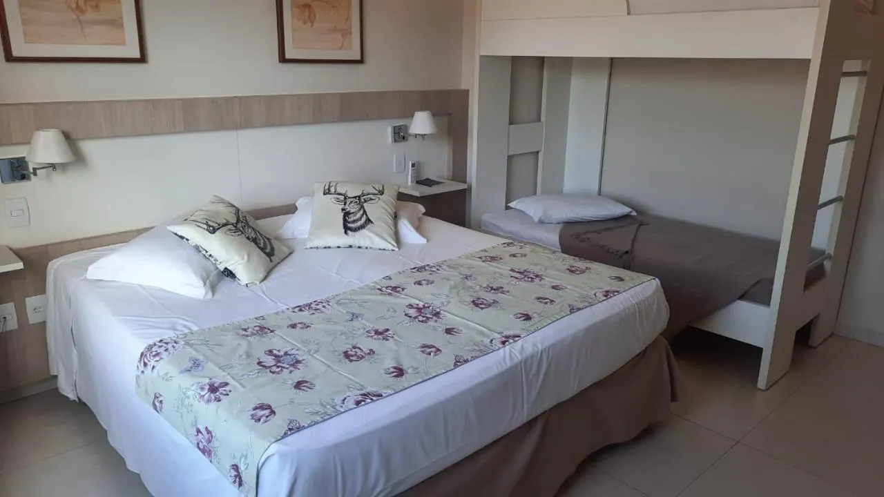 Bed in Lirio D'Água Hotel