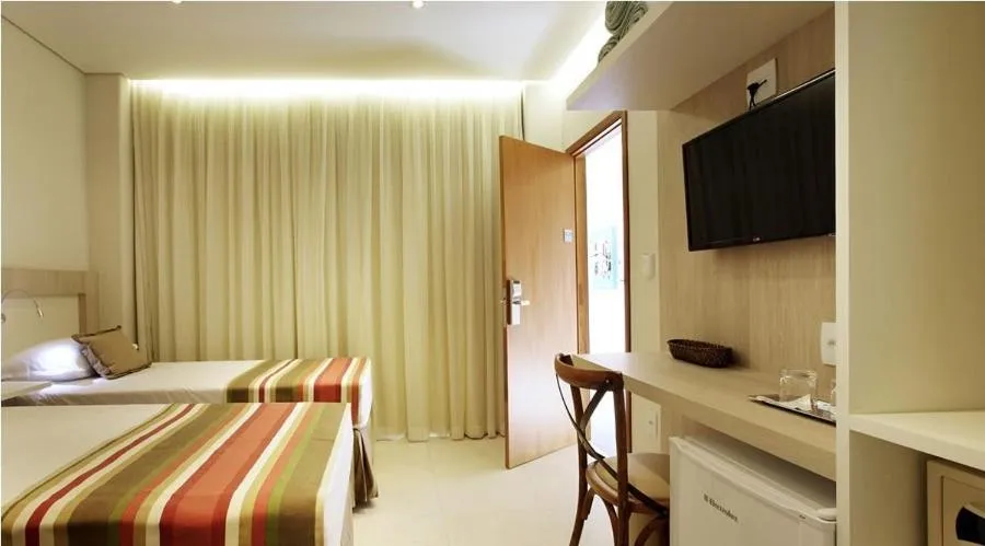 Photo of the whole room, Bed in Lirio D'Água Hotel