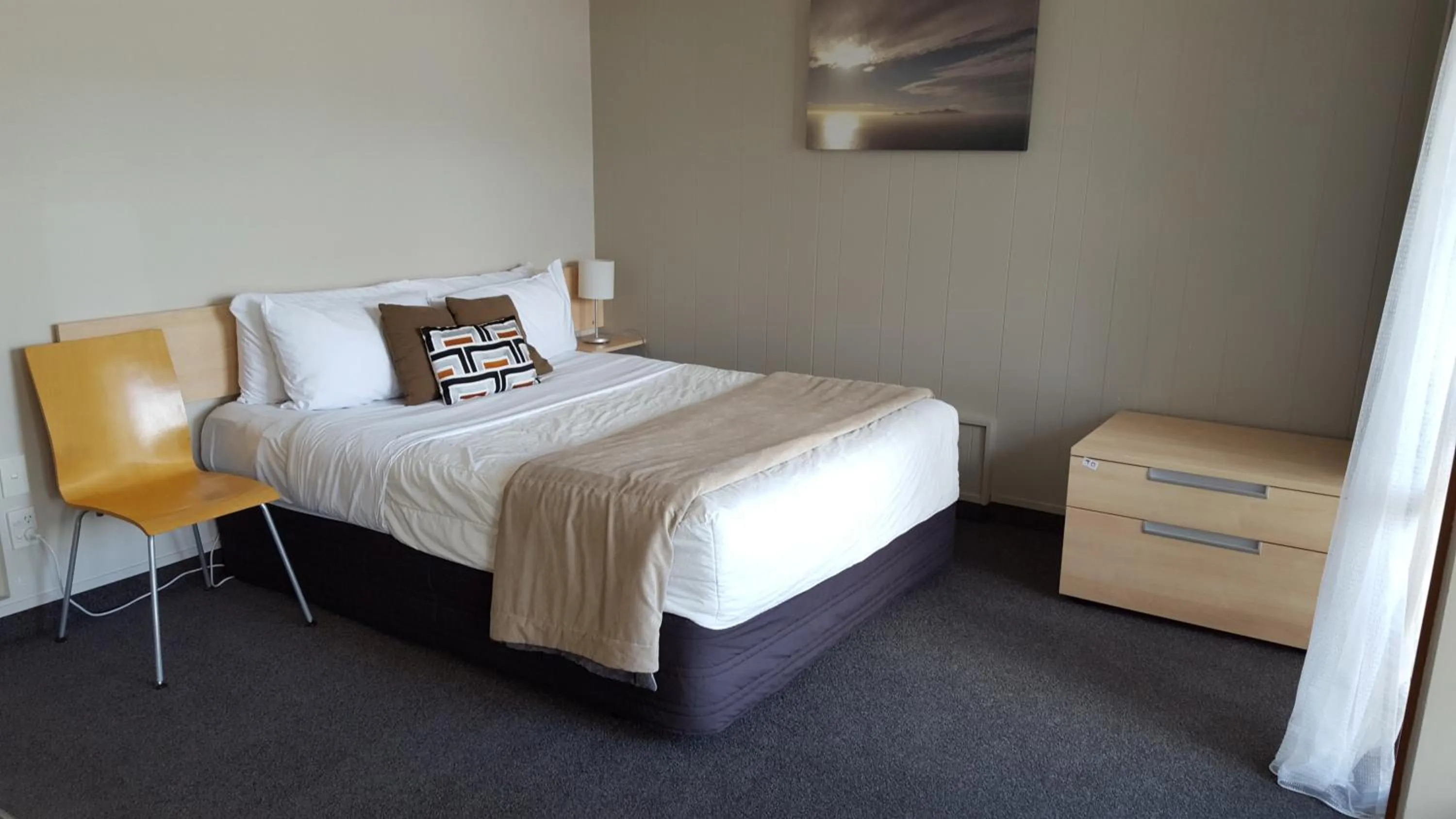 Bed in Akaroa Waterfront Motels