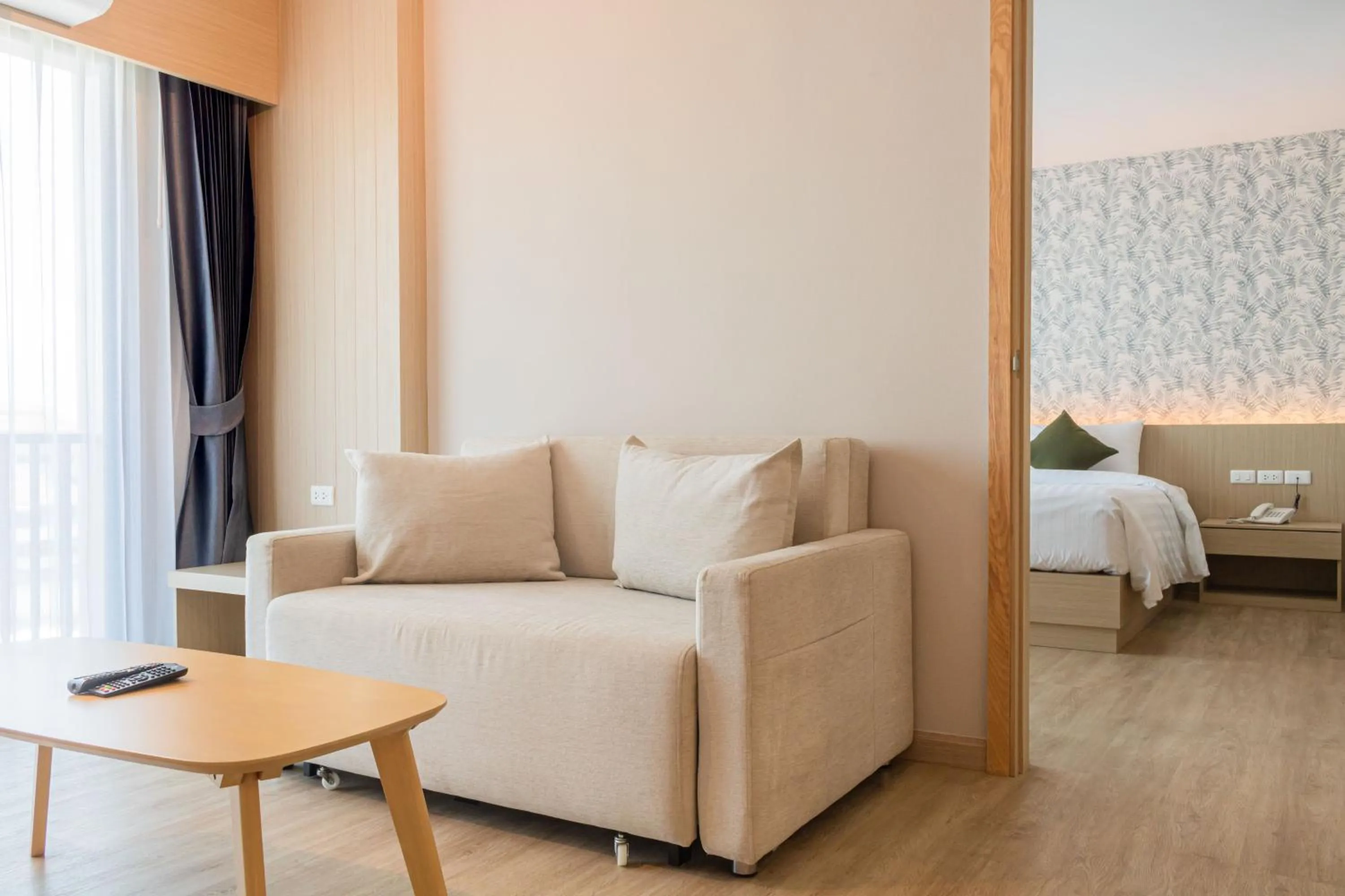 Living room, Bed in ONE Hotel