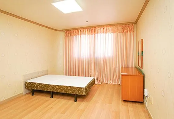Bed in Koresco Chiak Mountain Condominium