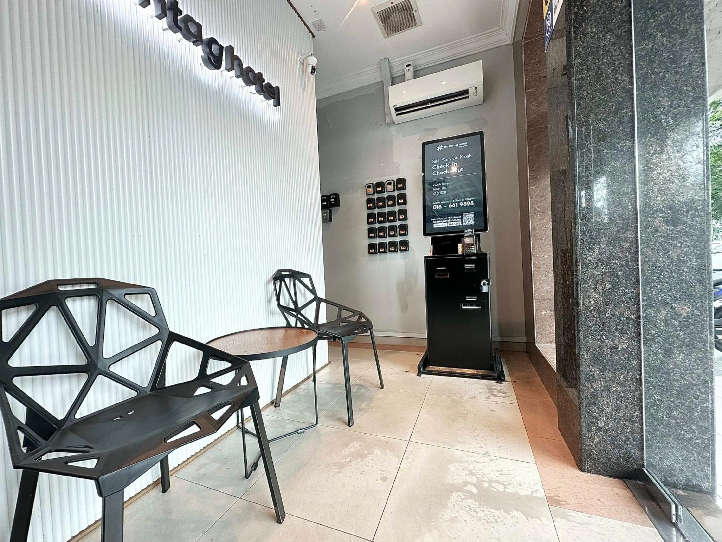 Seating area in # Hashtag Hotel - Self Check in