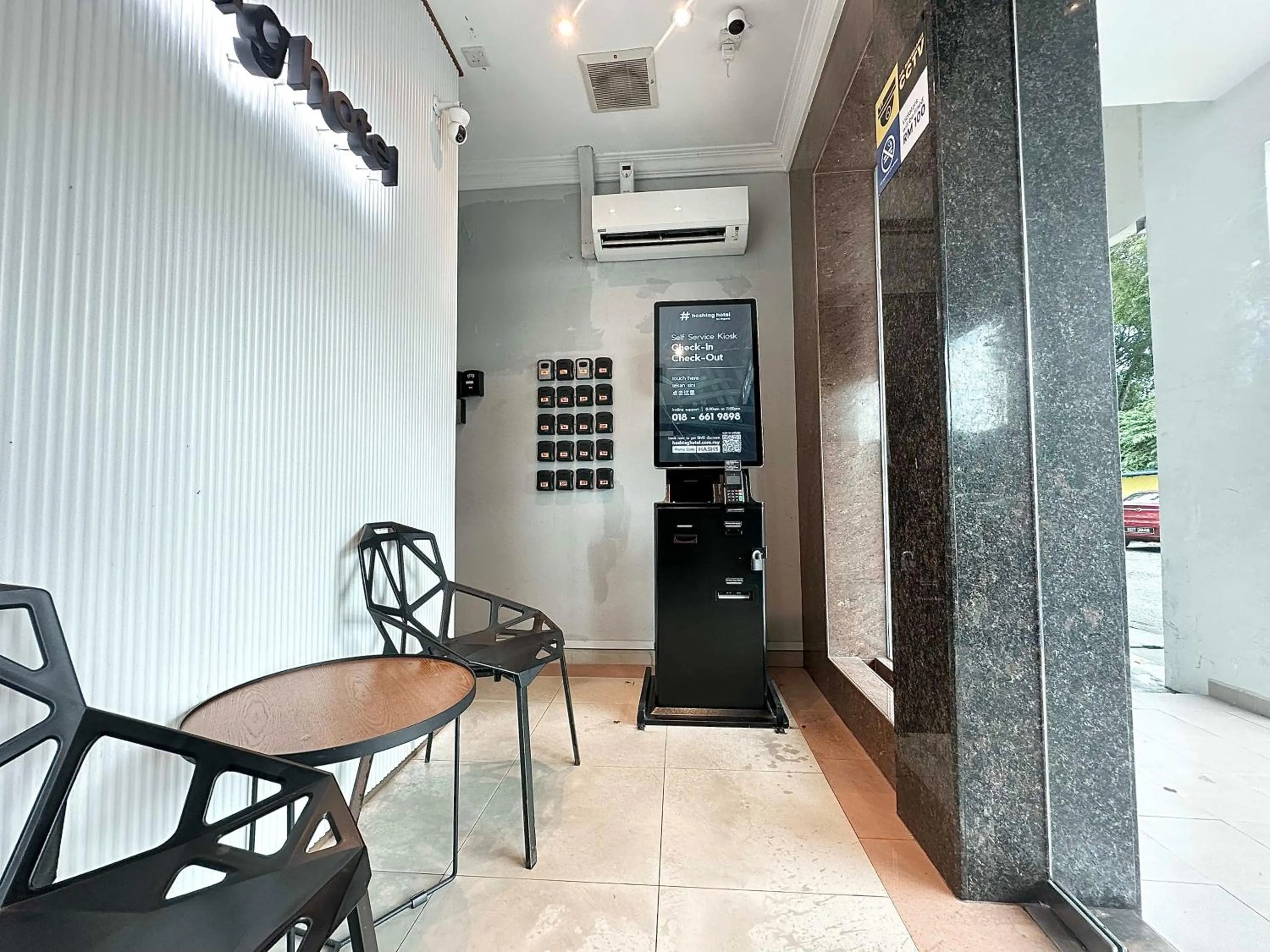 Seating area in # Hashtag Hotel - Self Check in