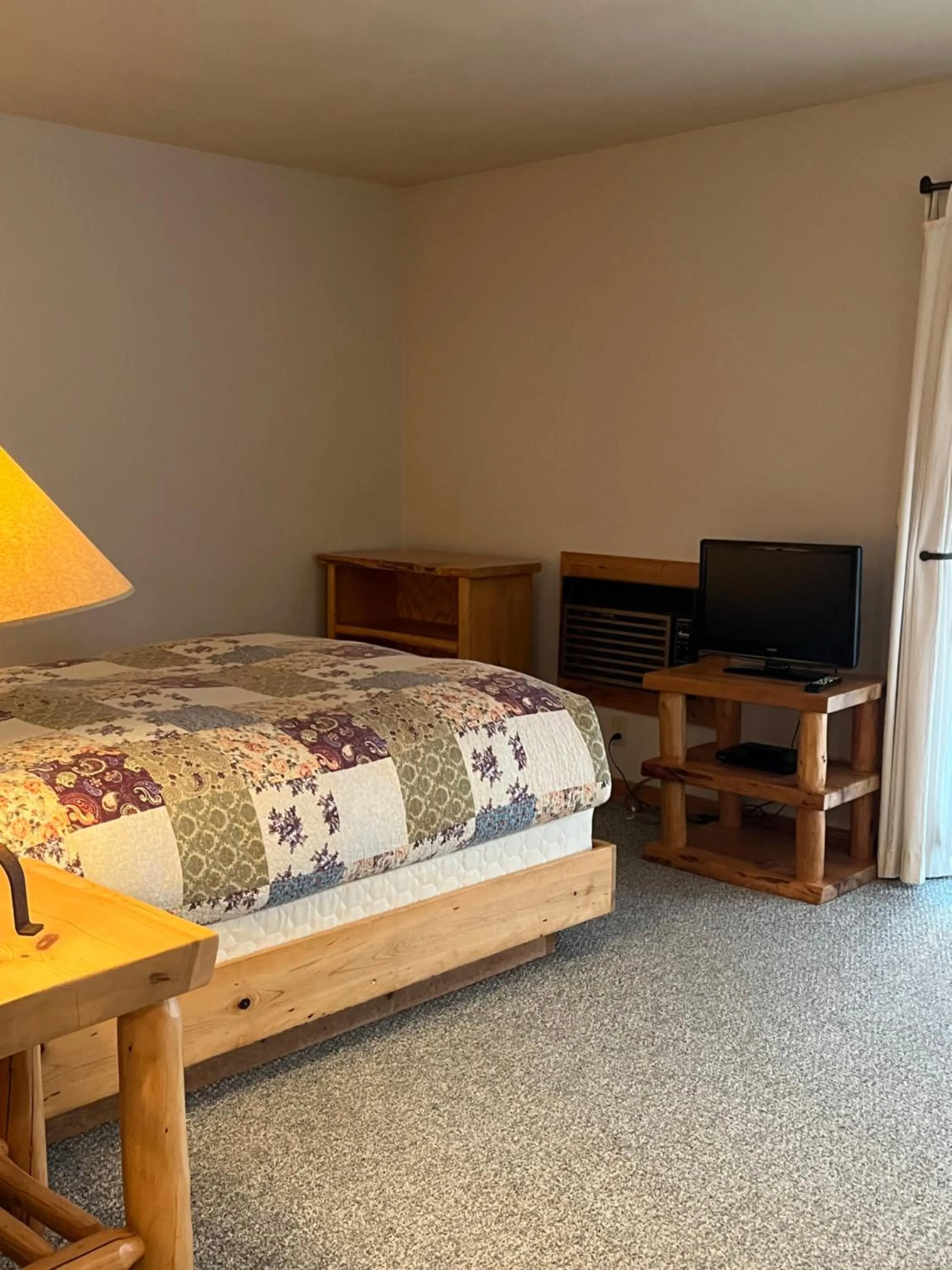 Bed in River Run Inn