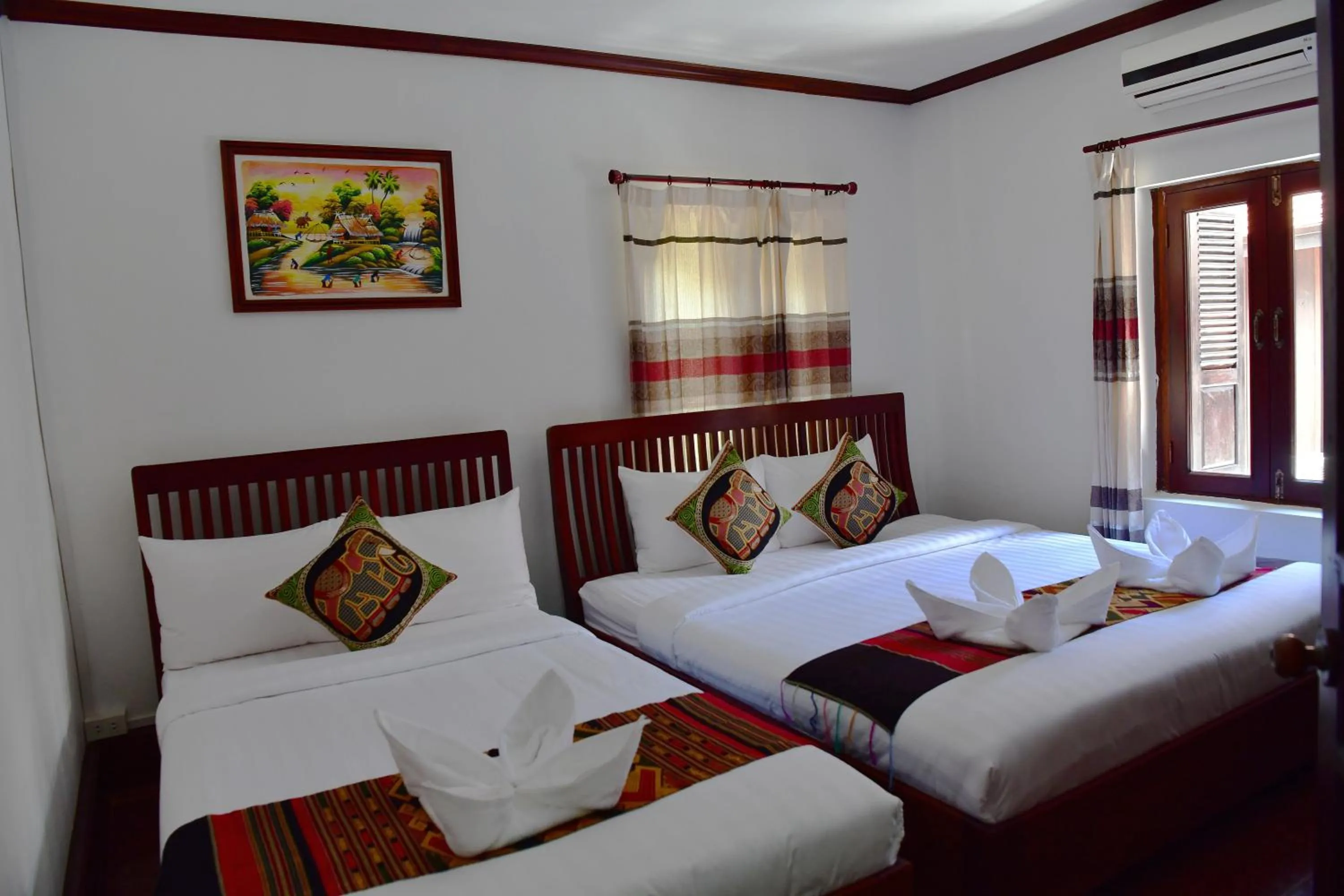 Photo of the whole room, Bed in Thatsaphone Hotel