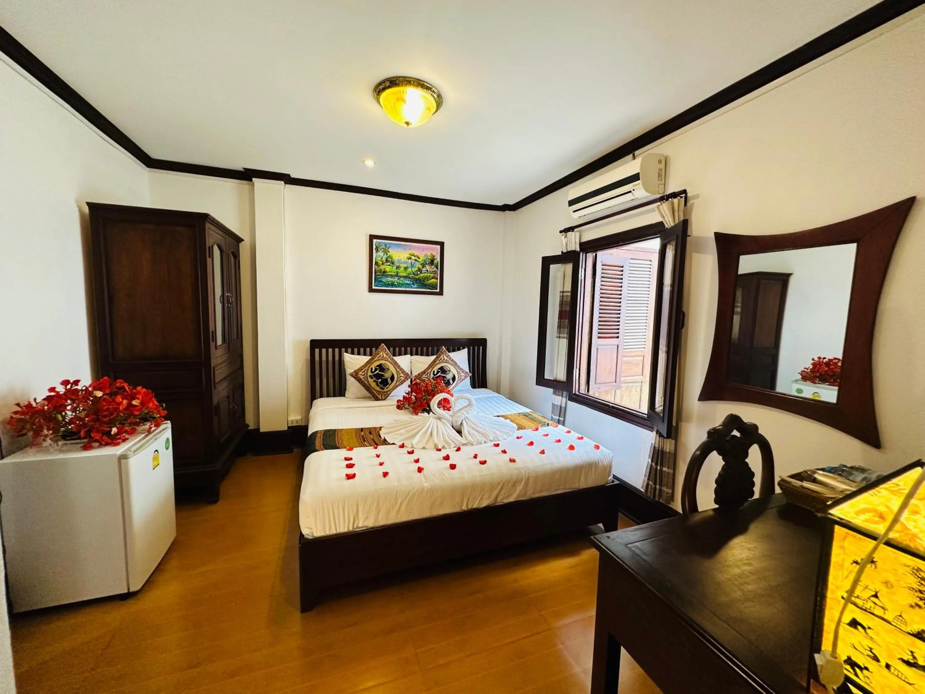 Bed in Thatsaphone Hotel