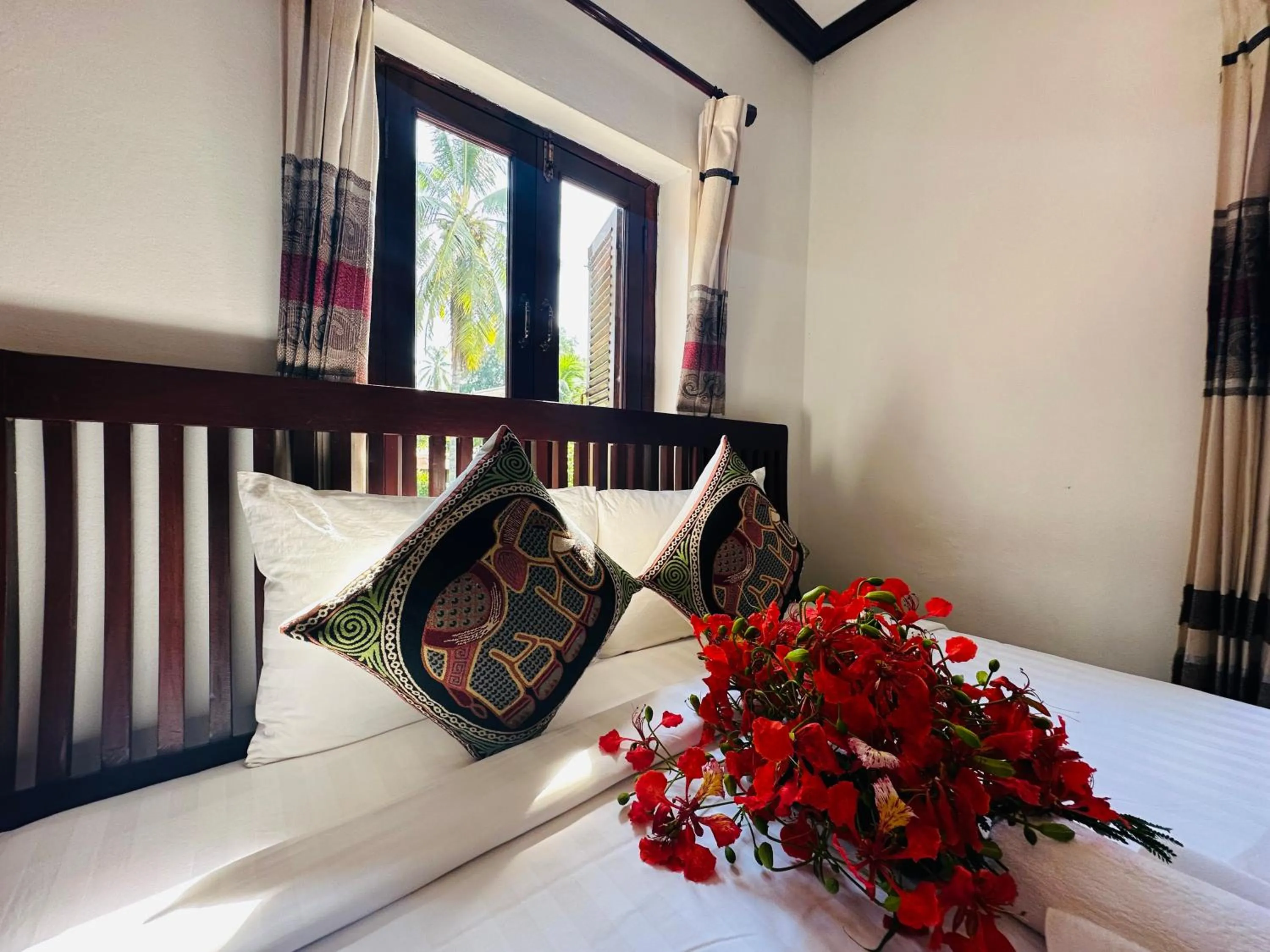 Bed in Thatsaphone Hotel