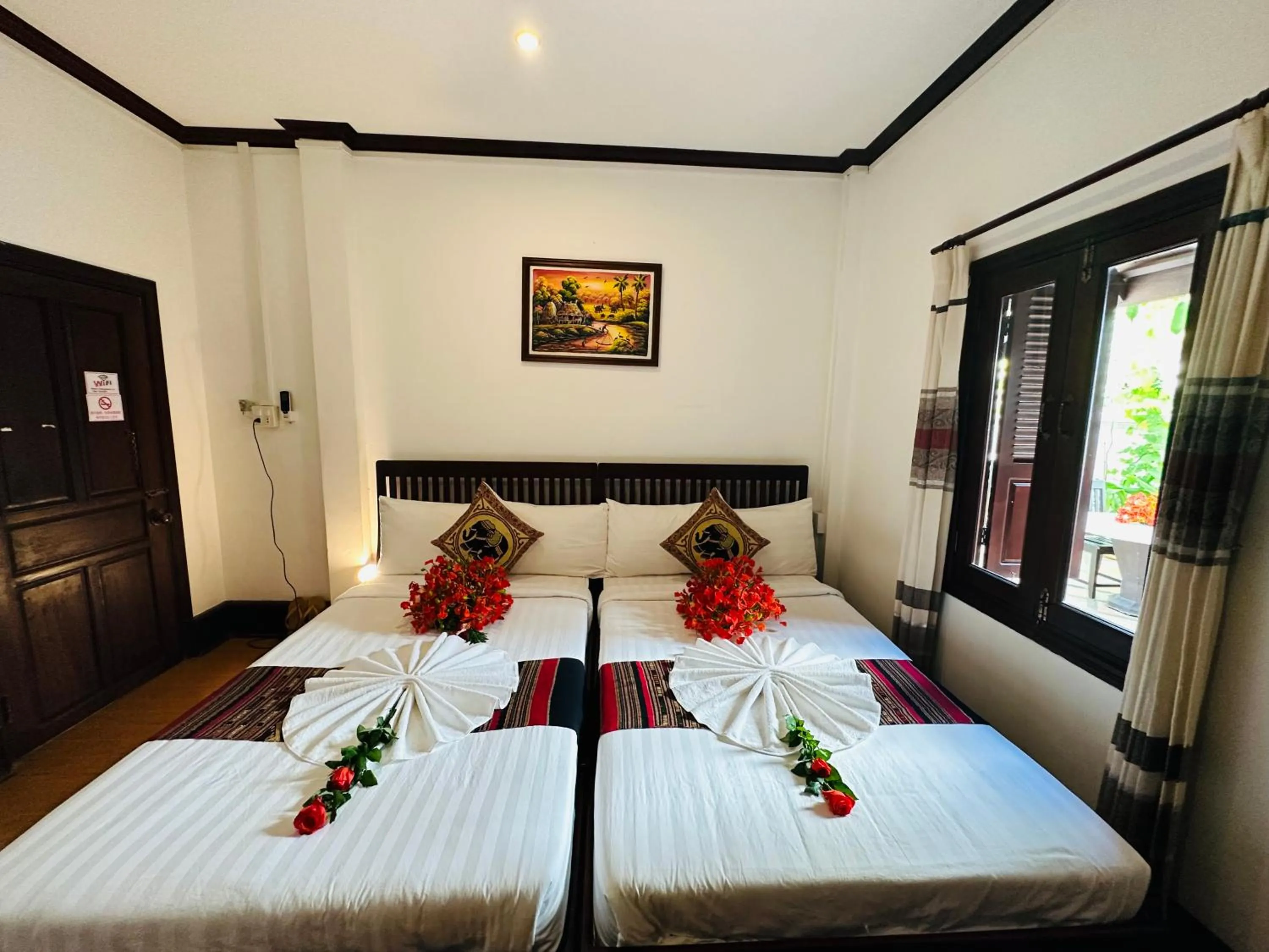 Bed in Thatsaphone Hotel